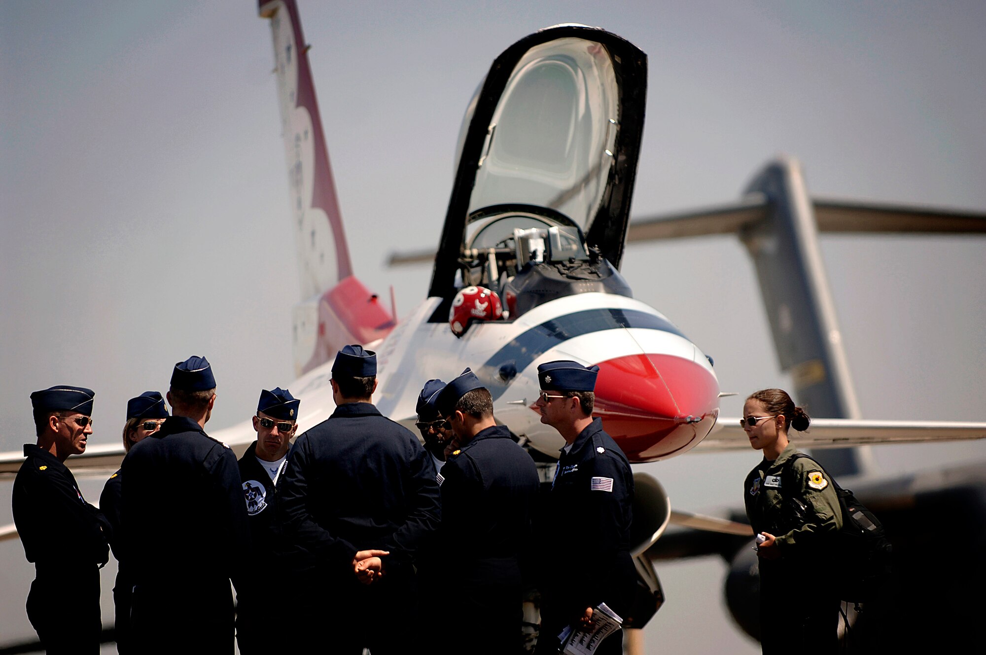 Lt. Col. Greg Thomas briefs the Thunderbird pilots after they arrive on the Charleston AFB flightline Monday. Colonel Thomas is the commander of the air demonstration team and flies the Thunderbirds number one jet and will be performing at the 2008 "Wings Over Charleston" Air Expo at Charleston AFB Saturday. (U.S. Air Force Photo/Senior Airman Nicholas Pilch)