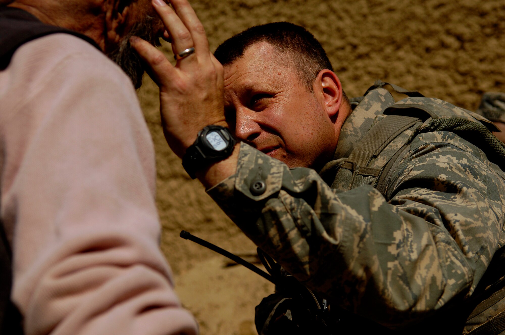 U.S. Air Force Capt. Marshall Fiscus examines a patient April 19, 2008, during a Village Medical Outreach at the Joybar village conducted by the Provincial Reconstruction Team, Bagram Air Field Afghanistan. Fiscus is the Chief Medical Officer assigned to the PRT and is deployed from Geilenkirchen, Germany. (U.S. Air Force photo by Master Sgt. Andy Dunaway) (Released)
