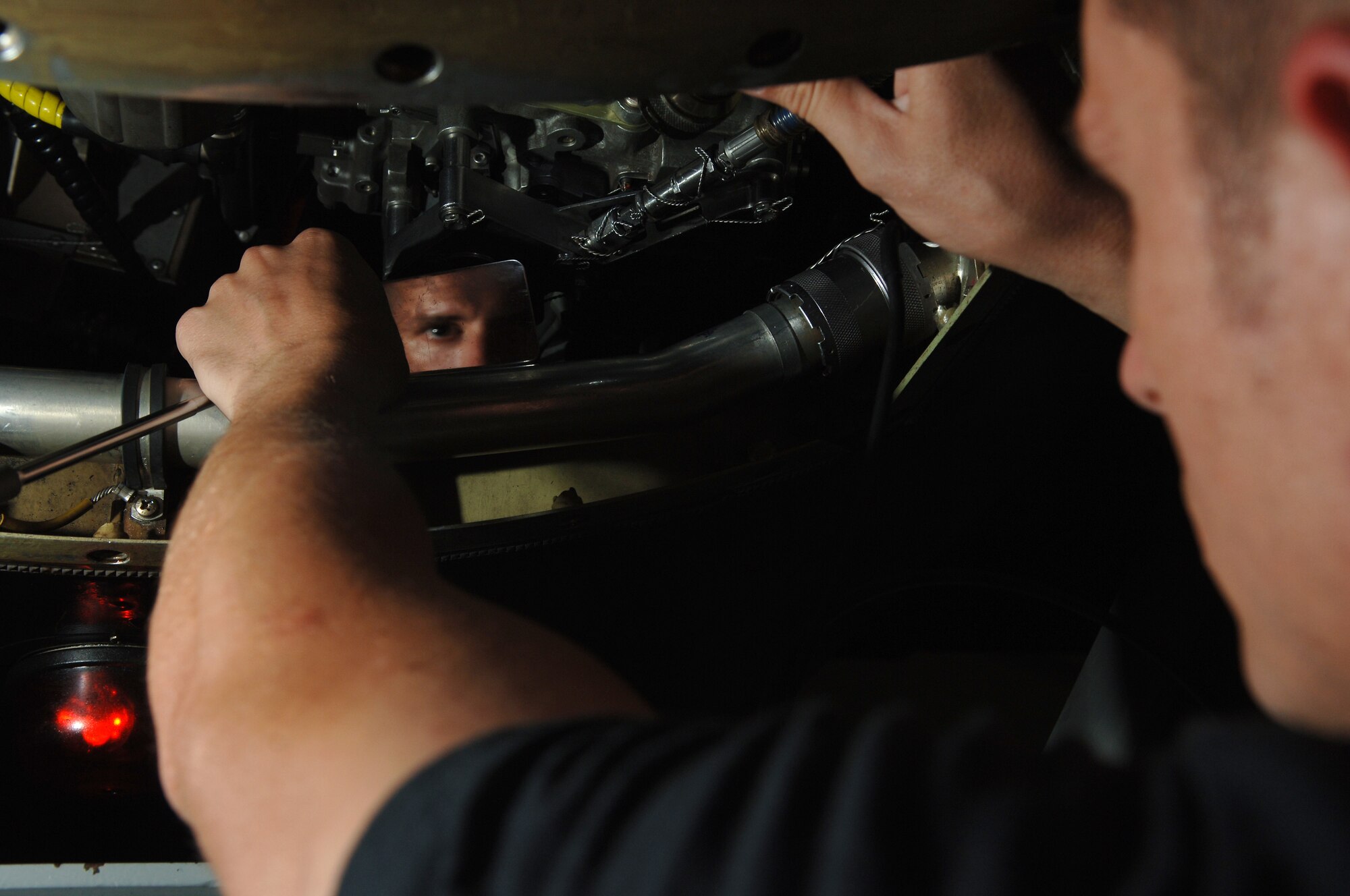 Tech. Sgt. Matthew Klein, 380th Expeditionary Maintenance Group quality assurance inspector, checks to ensure proper engine installation on a U-2 Dragon Lady during a key task listing inspection at a base in Southwest Asia, April 17, 2008.(U.S. Air Force photo/Senior Airman Levi Riendeau)(released)
