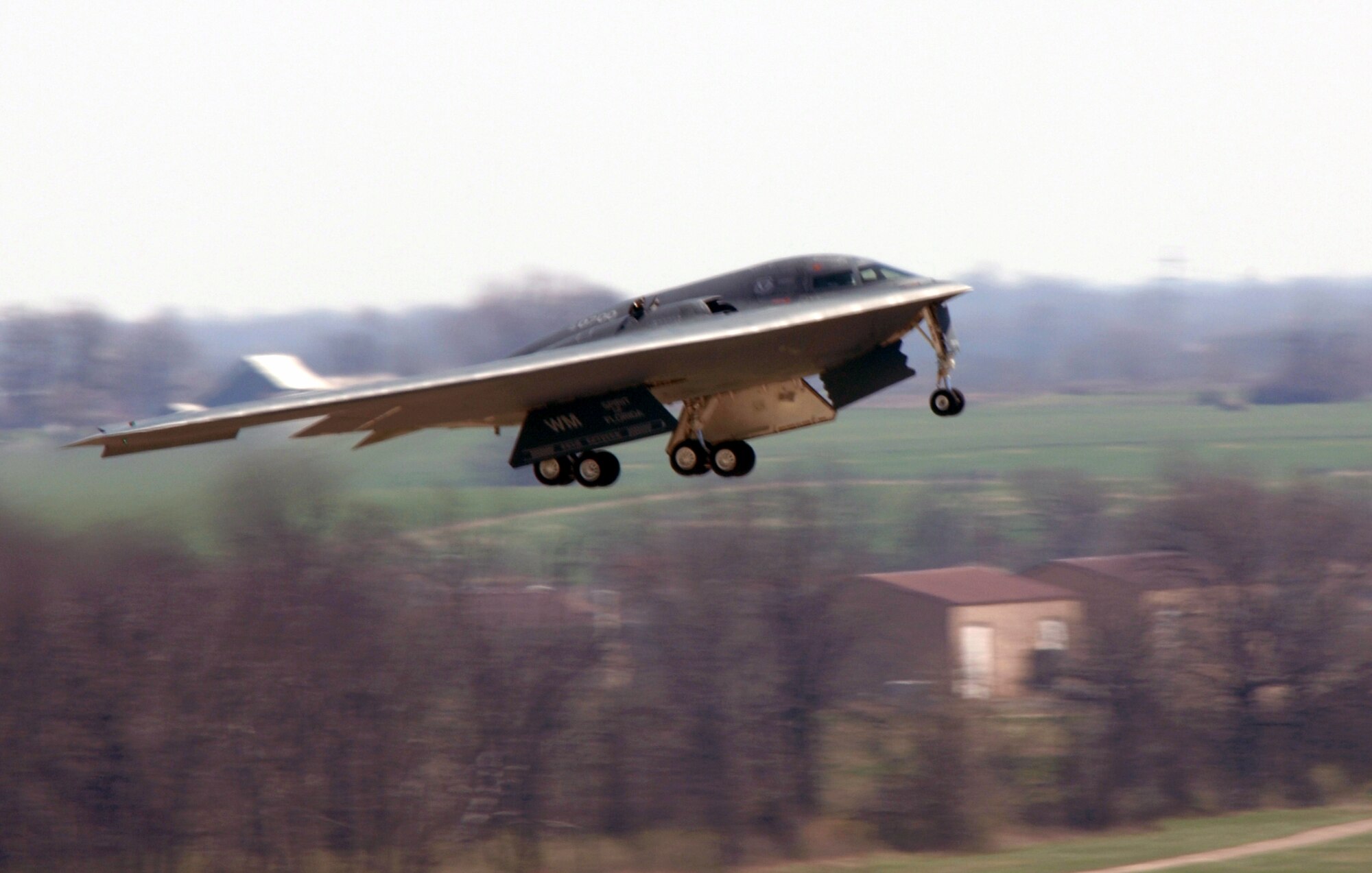 Col. Tom Bussiere and Maj. Rich Collins take off in a B-2 Spirit named the Spirit of Florida April 15 at Whiteman Air Force Base, Mo. The flight was the first since a B-2 crashed Feb. 23 at Andersen AFB, Guam. Colonel Bussiere is the 509th Operations Group commander, and Major Collins is the 394th Combat Training Squadron operations officer. (U.S. Air Force photo/Staff Sgt. Charles Larkin Sr.) 
