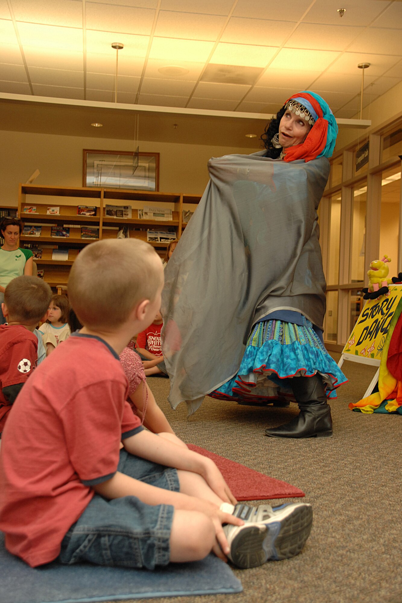 HOLLOMAN AIR FORCE BASE, N.M. -- Terry Alvarez, story dancer, performs Octopus Lady and Crow in celebration of National Library Week April 16 at the base library here. National Library Week is a national observance sponsored by the American Library Association and libraries across the country. (U.S. Air Force photo/ Airman 1st Class Jamal D. Sutter)