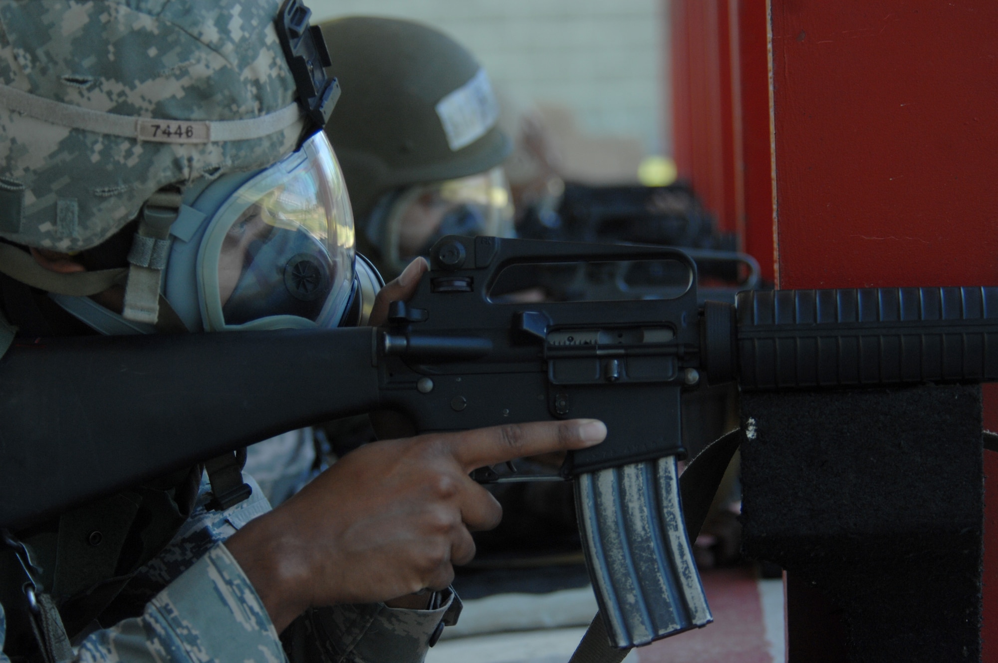 MOODY AIR FORCE BASE, Ga. --  Airmen shoot the M-16 rifle during combat arms training here April 17. Airmen must complete numerous shooting stances with and without a gas mask. (U.S. Air Force photo by Senior Airman Gina Chiaverotti)