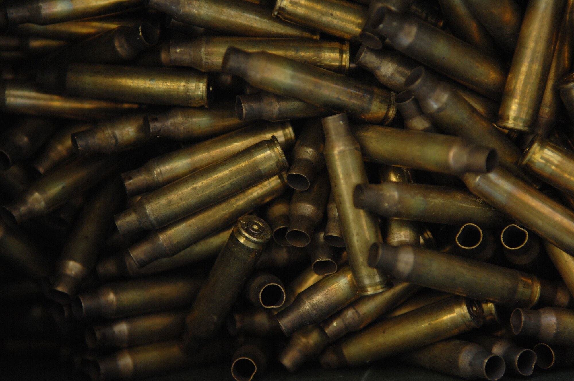 MOODY AIR FORCE BASE, Ga. -- Empty brass casings from a dozen M-16 rifles lay in a pile after Airmen completed combat arms training here April 17. (US. Air Force photo by Senior Airman Gina Chiaverotti) 