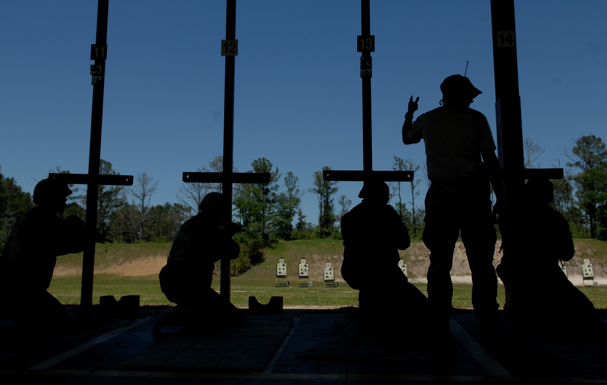 MOODY AIR FORCE BASE, Ga. -- Airmen prepare to shoot the M-16A2 rifle during combat arms training here April 17. Airmen who are within 90 days of deploying must complete the course. (U.S. Air Force photo by Senior Airman Gina Chiaverotti) 