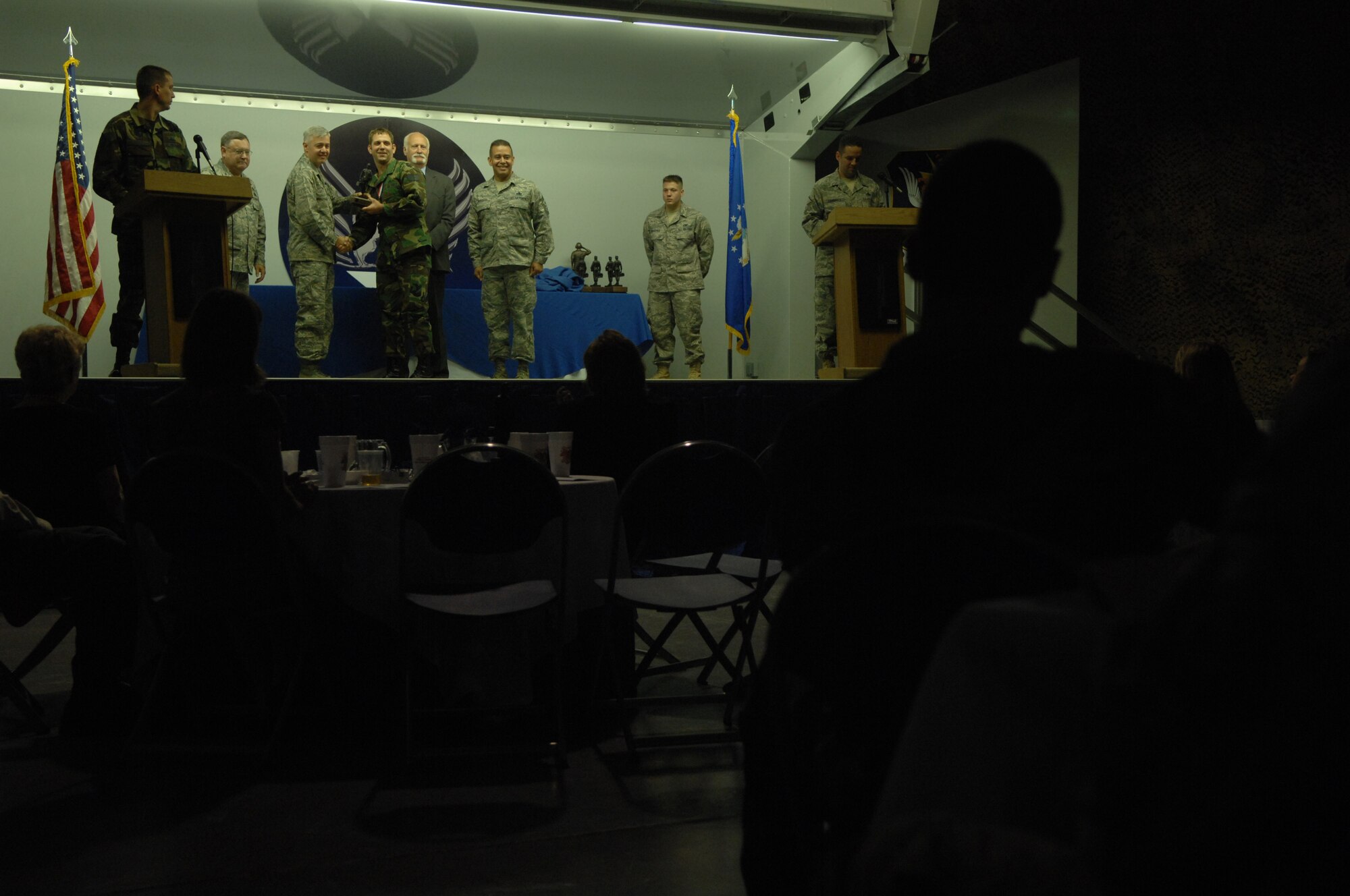 Moody personnel applaud as a nominee receives an award during the Maintenance Professional of the Year ceremony here April 19. The "best of the best" were recognized for keeping Moody's aircraft inventory flying. (U.S. Air Force photo by Senior Airman Gina Chiaverotti) 