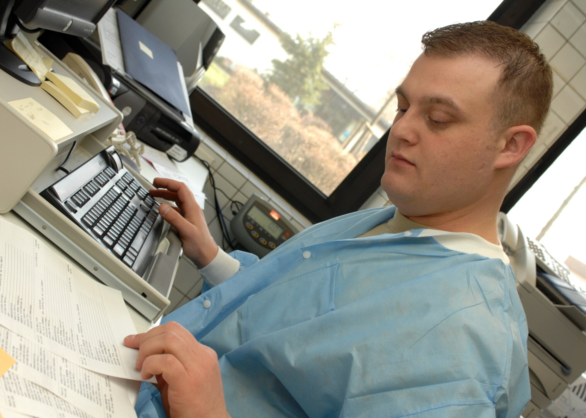 BITBURG AIR BASE, Germany- Senior Airman Charles Crow, 52nd Medical Support Squadron, enters test data into a computer system at the Bitburg Laboratory April 15, 2008. Lab technicians around the nation are honored for their contribution to the medical community during National Medical Laboratory Professionals Week April 20-26. (U.S. Air Force photo/Airman 1st Class Jenifer Calhoun)