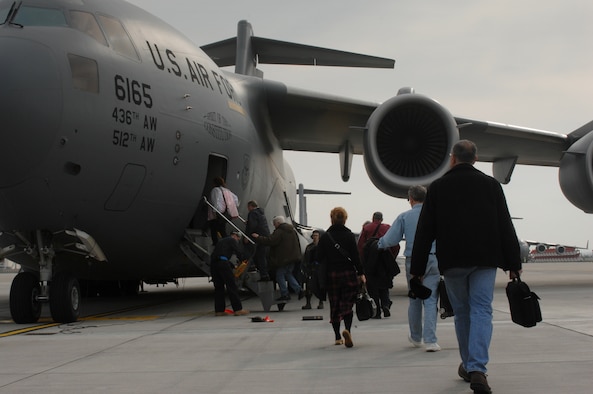 Passengers are loaded into a C-17 headed for Dover Air Force Base, Del.,  April 21. Space-A travellers are given seats aboard Department of Defense-owned or controlled aircraft after all mission requirements, including cargo and duty passengers, have been met. Photo by Airman 1st Class Nathan Lipscomb