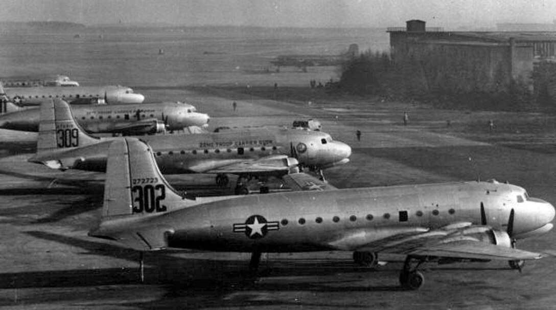Awaiting their turn to take off for Berlin, U.S. Air Force C-54s will land at Gatow Airfield in the British sector of Berlin just one hour away from their British zone airlift supply terminal at Fassberg, Germany. 