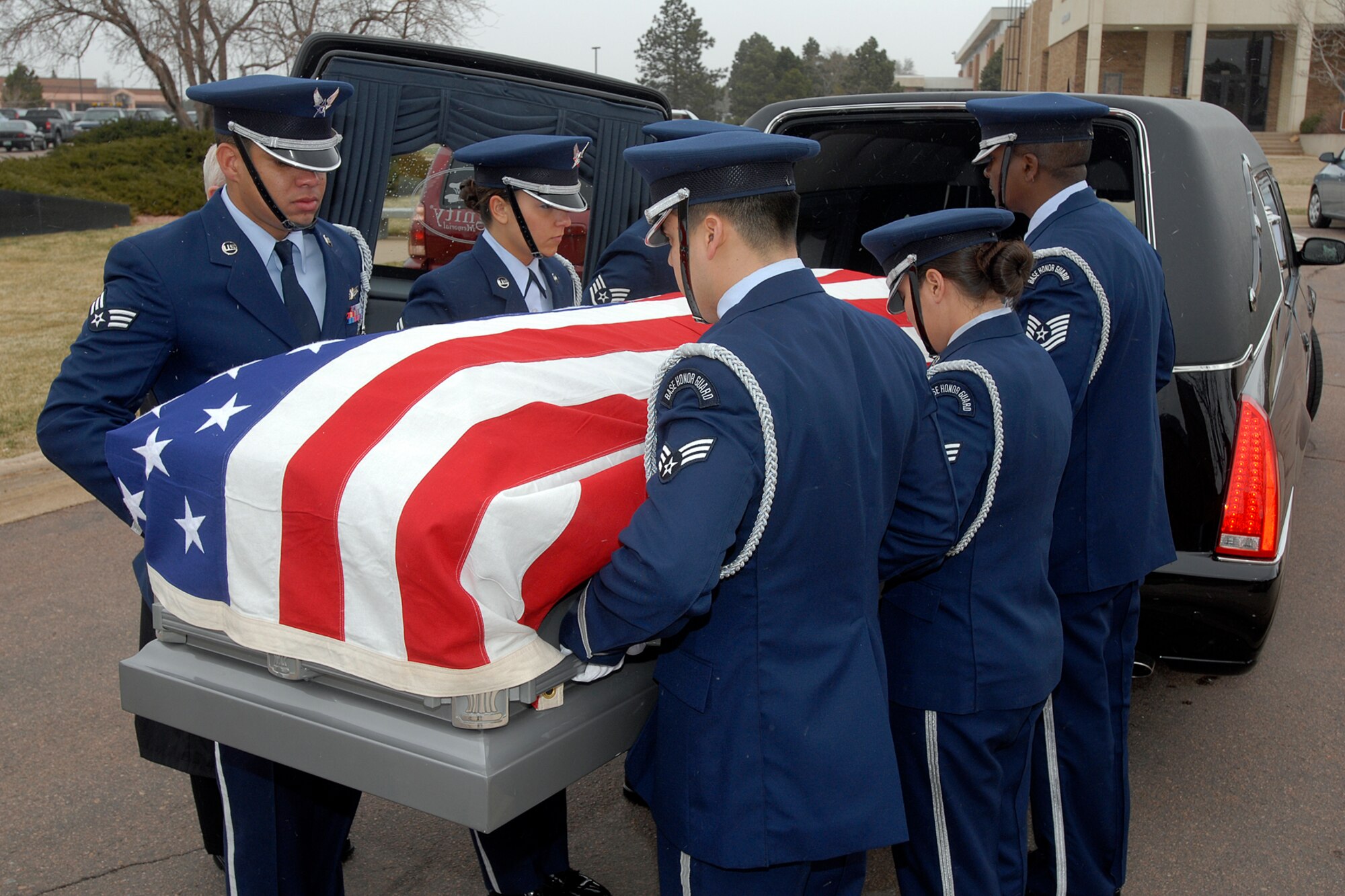 The High Fronter Honor Guard simulates a mock funeral procession for the Air Force-level LeMay inspection team April 10 at the Peterson chapel. The team inspected the 21st Services Squadron April 7-11 to see if they qualified as the “best of the best” of services squadrons throughout the Air Force. (U.S. Air Force photo/Larry Hulst)