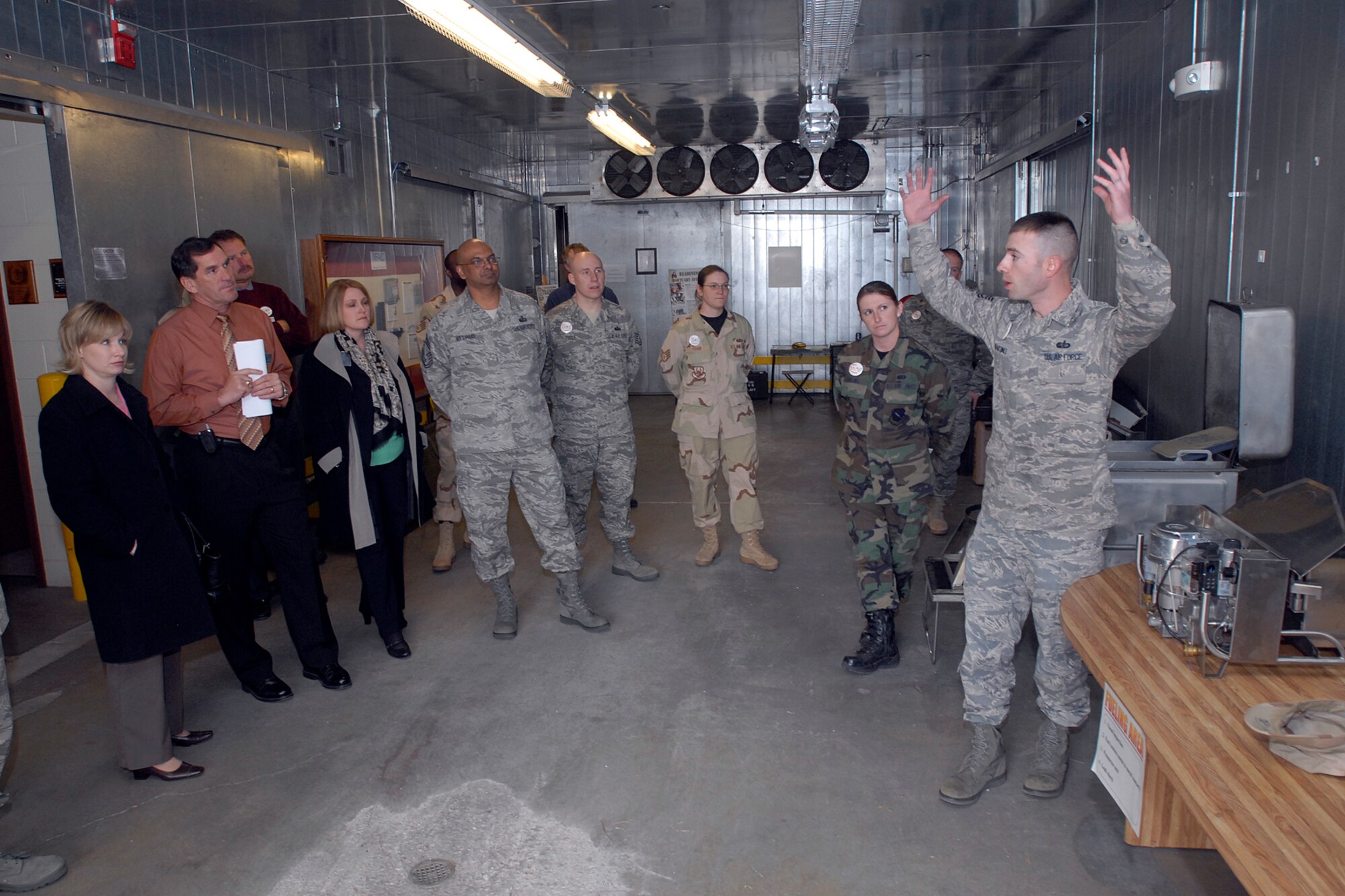 Tech. Sgt. James Martinez briefs Air Force-level LeMay award inspectors on readiness equipment commonly used by the 21st Services Squadron in the event of a deployment April 9 on Peterson Air Force Base, Colo. The team inspected the 21st Services Squadron April 7-11 to see if they qualified as the “best of the best” of services squadrons throughout the Air Force. (U.S. Air Force photo/Larry Hulst)