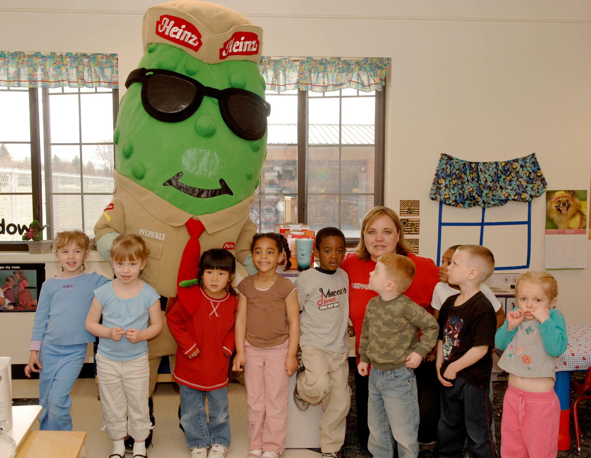 FAIRCHILD AIR FORCE BASE, Wash. – Private Pickle, mascot for Heinz, visits the preschool children at the Child Development Center here April 18. Private pickle visited the children to teach them about safety and stranger awareness during the official Month of the Military Child. (U.S. Air Force photo / Airman 1st Class Darlene West)
