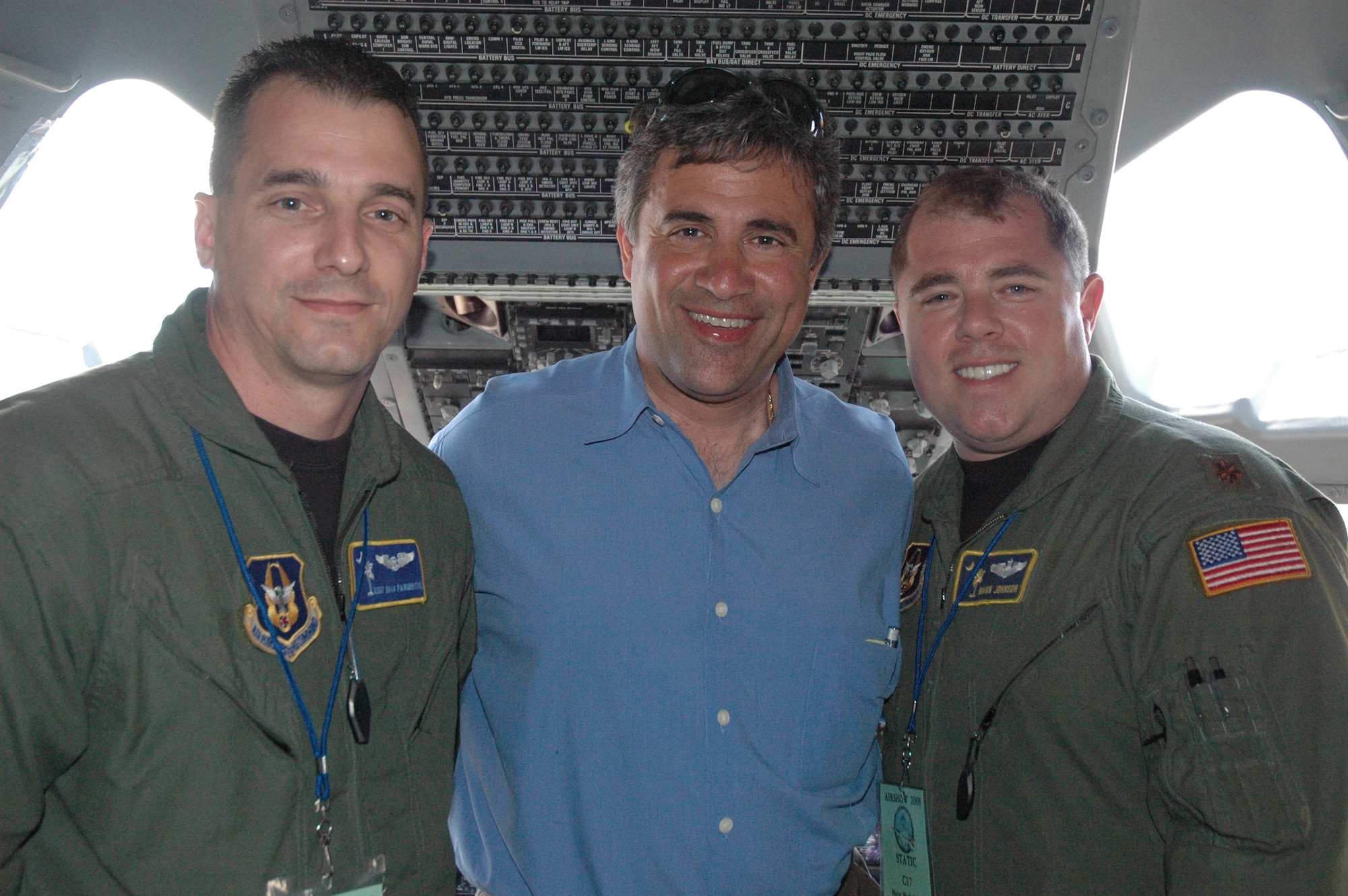 Major Mark Johnson and Technical Sergeant Brian Farmintino, 300th Airlift Squadron, Charleston Air Force Base, S.C., pose with Mayor Bill Saffo of Wilmington, N.C., for the 2008 Coastal Carolina Air Show. (photo by Senior Airman Dani Pacheco, USAFR)