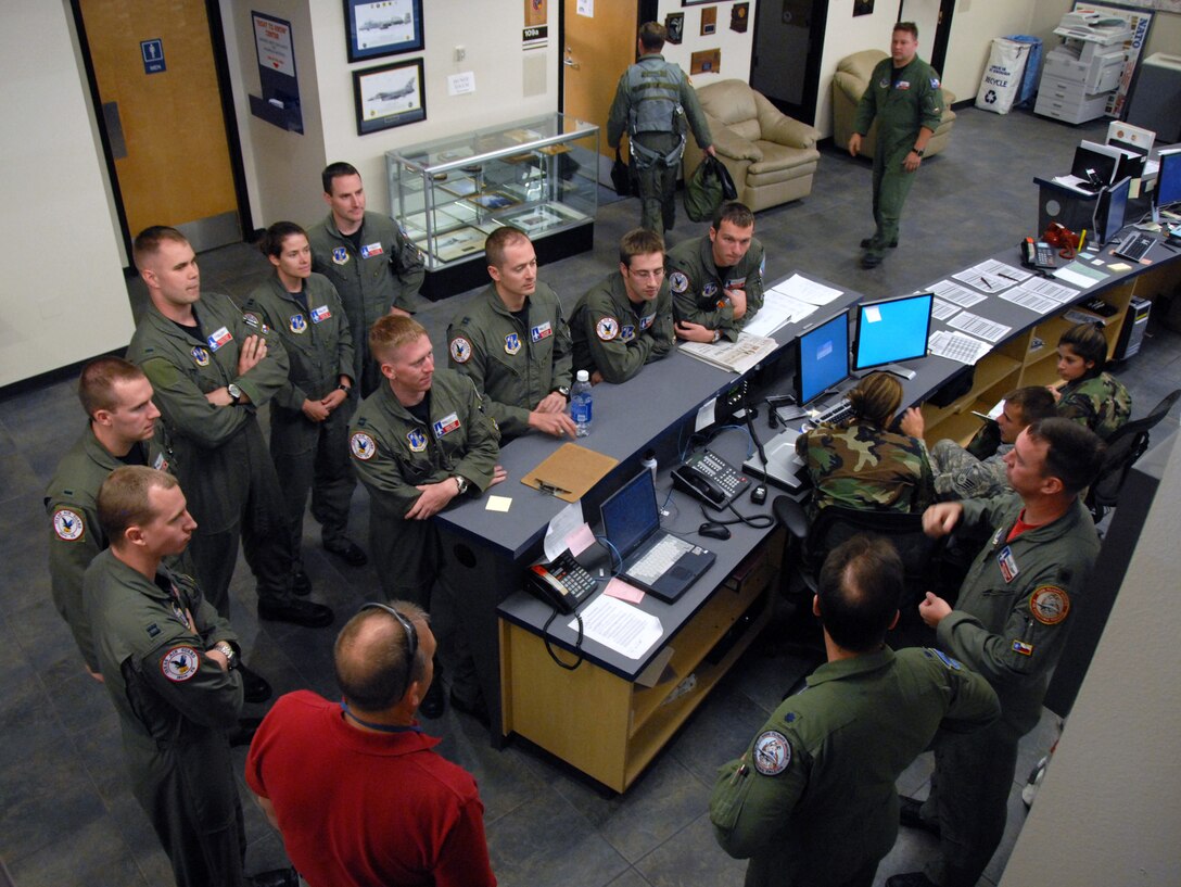 F-16 student pilots from the 149th Fighter Wing, Texas Air National Guard, San Antonio, Texas, gather for a brief of the day's mission at Davis-Monthan Air Force Base in Tucson, Arizona on April 14, 2008. The 149th is taking part in Coronet Cactus, an annual training exercise that serves as a "final exam" deployment for the students. (Air National Guard photo by SSgt Andre Bullard)(RELEASED) 