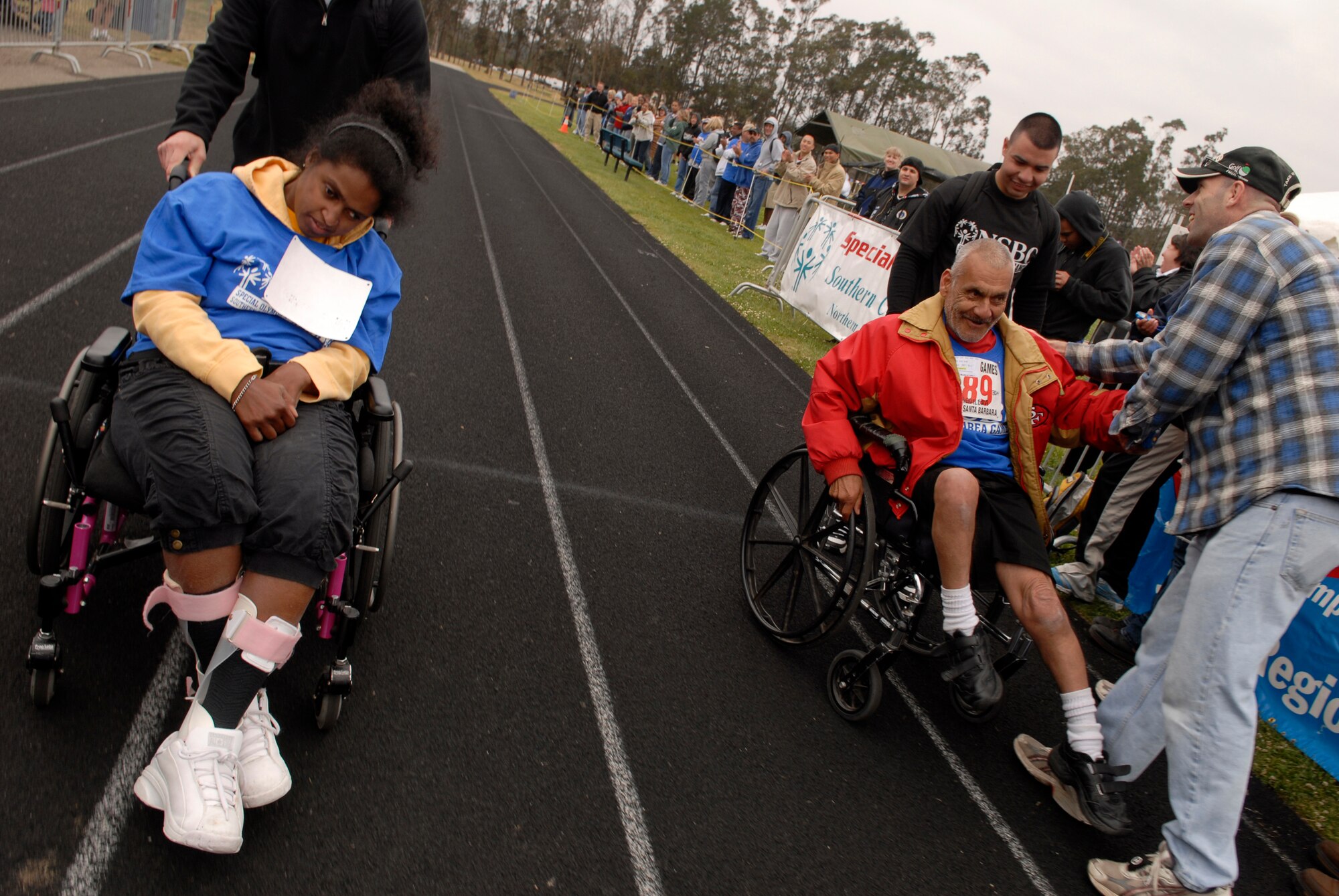 VANDENBERG AIR FORCE BASE, Calif. -- Racers reach the finish line after a competition during the Special Olympics here April 19. (U.S. Air Force photo/Airman 1st Class Christian Thomas) 