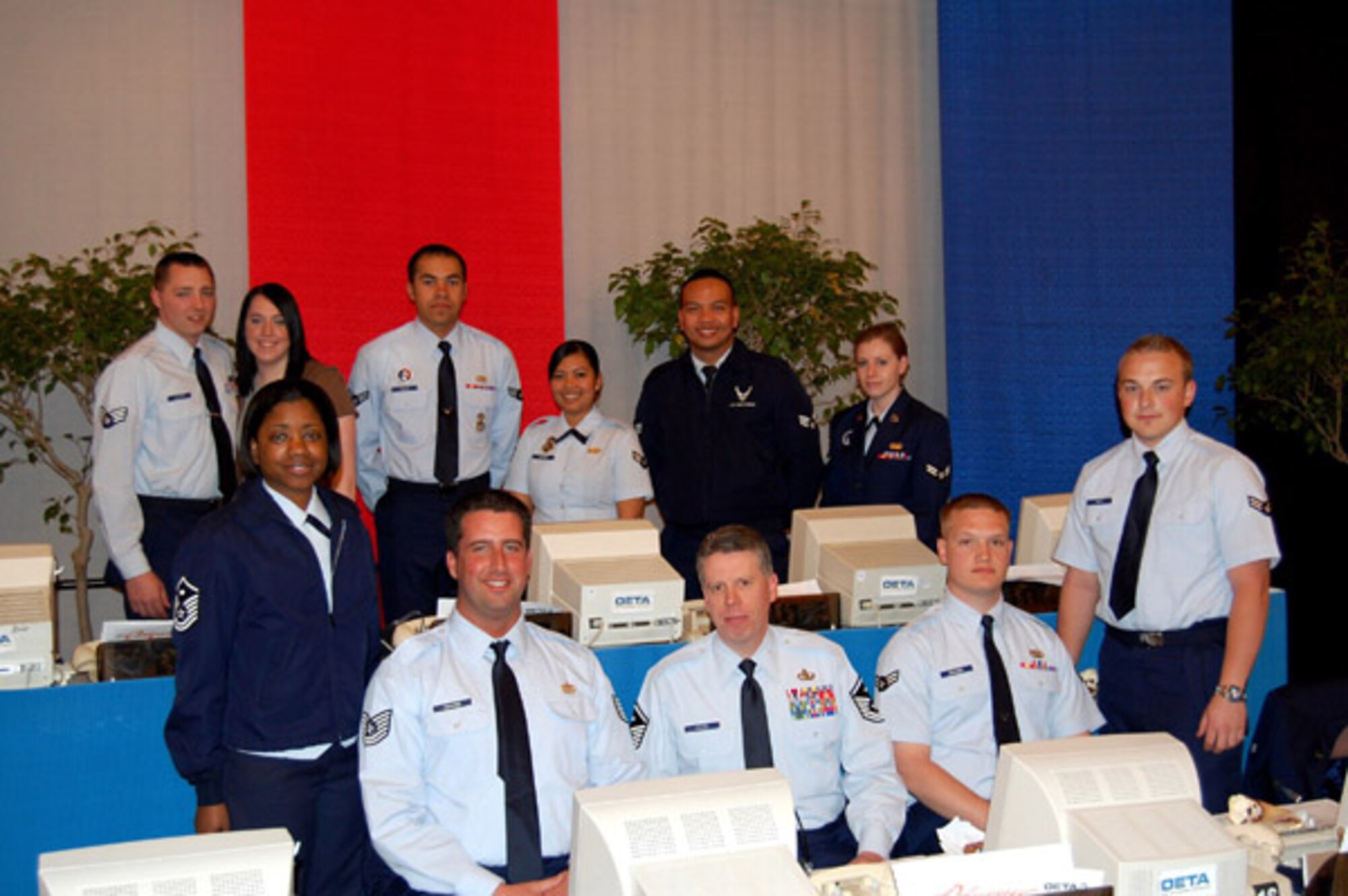 Air Force members pictured above answered phones and took pledges on March 8th in support of the 2008 Oklahoma Educational Television Authority (OETA) Festival. About a dozen participants from the 507th Air Refueling Wing and 513th Air Control Group, base Honor Guard, active duty Services and Security Forces manned the phones for approximately five hours and raised more than $28,600. Senior Airman Zachary Walker, back left, and his fiance Lynette, have been volunteering for three years. “It is a great experience,” said Airman Walker, “It is always rewarding to help the local community.” Reserve Airmen have been participating in the OETA Festival for more than 20 years.