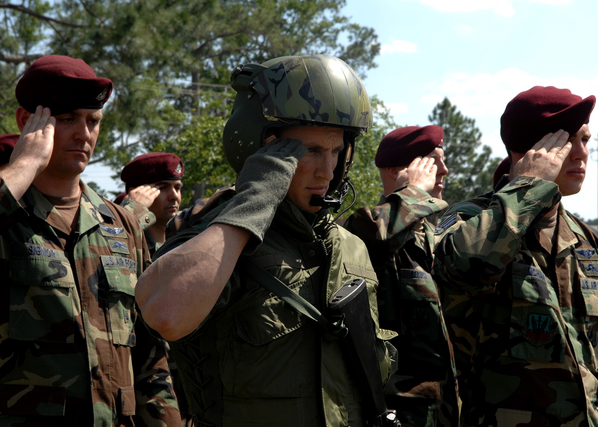 MOODY AIR FORCE BASE, Ga. --  Staff Sgt. Kyle Minshew, 38th Rescue Squadron pararescueman, salutes while in the ‘missing man’ formation in the role of Airman 1st Class William H. Pitsenbarger, a Congressional Medal of Honor recipient here April 18. A re-dedication ceremony was held in honor of Airman Pitsenbarger for selfless and heroic acts during the Vietnam war that lead to his death on April 11, 1966. (U.S. Air Force photo by Airman 1st Class Brittany Barker)