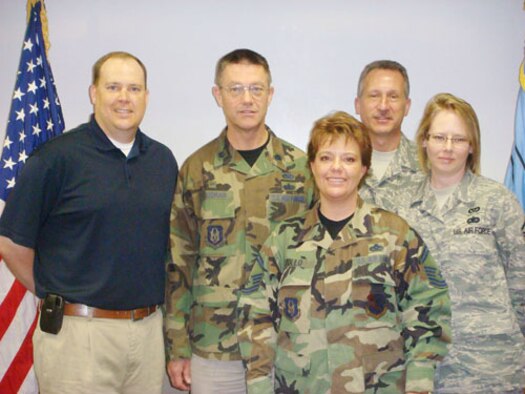 Five 507th Air Refueling Wing members were selected to receive Air Force Reserve Command Civil Engineer Awards for 2007. Pictured from left are Joseph Wade, Lt. Col. Ernest Goodman, Senior Master Sgt. Jodie Zollo, Chief Master Sgt. Gary Bourisaw and Master Sgt. Wendy Ellyson.  Not pictured, Tech. Sgt. Deric Nixon.