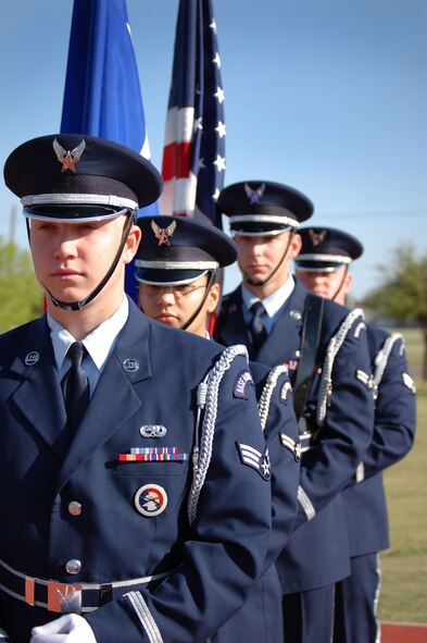 ABILENE, Texas -- The Dyess Honor Guard presents the colors during the Special Olympics April 19. More than 500 people participated in the games. (U.S. Air Force photo by Airman 1st Class Jennifer Romig)