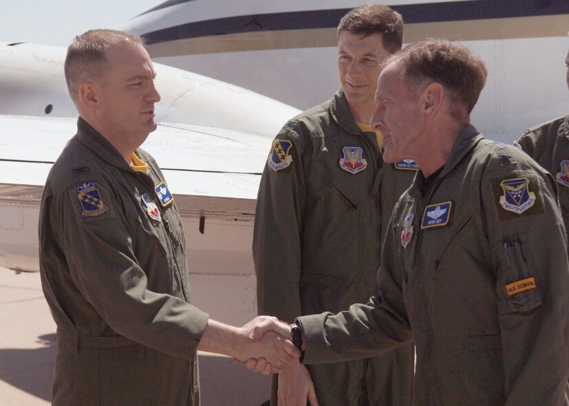 DYESS AIR FORCE BASE, Texas -- Lt. Gen. Norman Seip, 12th Air Force commander (right), greets Col. J.C Valle, 7th Operations Group commander on the flightline April 18. General Seip visit to Dyess included presenting an Airman's Medal and attending the World's Largest Barbeque. (U.S. Air Force photo by Airman 1st Class Breaux)
