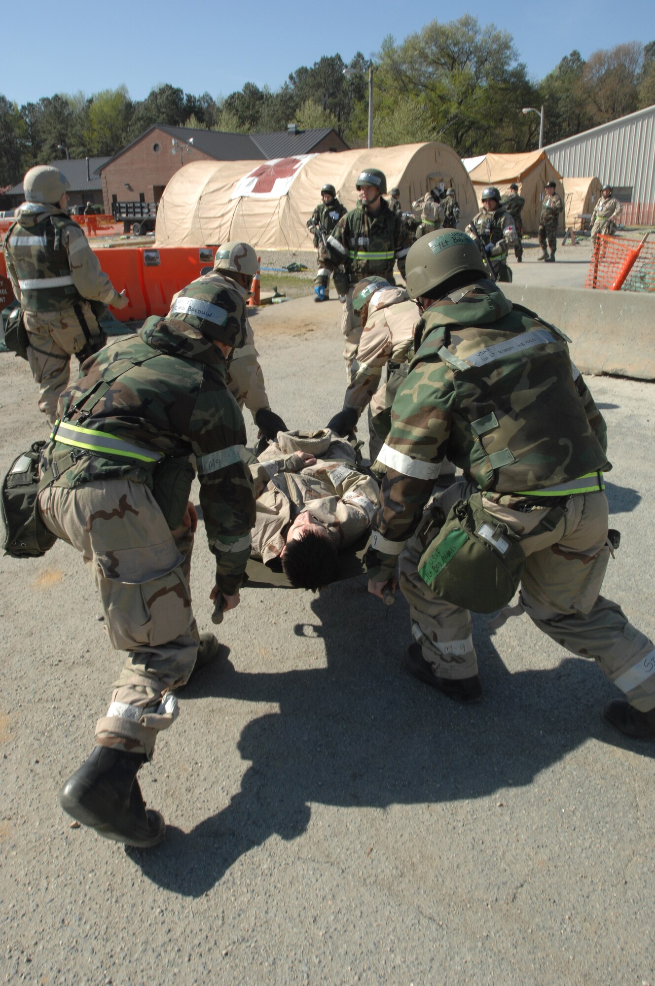 A simulated patient from the 1st Comptroller Squadron is transported to the medical tent after sustaining injuries during a simulated robbery of the comptroller tent April 15. The simulations were part of an Operational Readiness Inspection which tested Airmen's ability to survive and operate in a deployed environment. (U.S. Air Force photo/Senior Airman Christopher L. Ingersoll) 