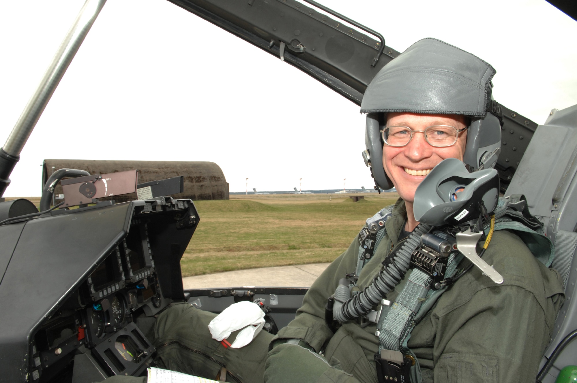 SPANGDAHLEM AIR BASE, Germany -- Chief Master Sgt. Vance Clarke, 52nd Fighter Wing command chief, smiles in the cockpit of an F-16 Viper before receiving an incentive flight. The flight was part of a program to help senior leaders gain a better understanding of the base operations. “It also gave me a chance to get out and see the hard work done by the enlisted troops of the 52nd Operations and Maintenance Groups,” Chief Clarke said. (U.S. Air Force photo/Senior Airman Logan Tuttle)  