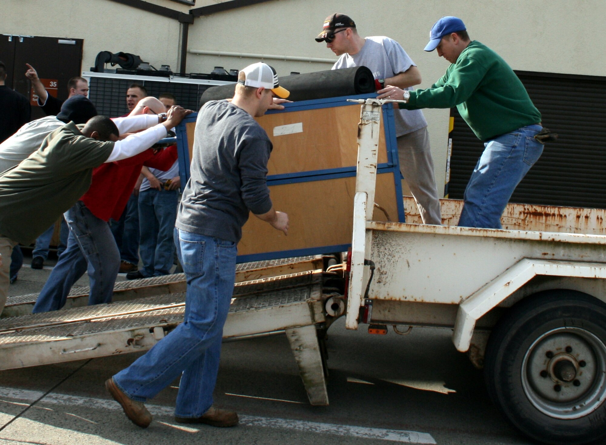 SPANGDAHLEM AIR BASE, Germany – Volunteers help vendors pack up after the end of the base spring bazaar. The bazaar, featuring more than one hundred vendors, was hosted by the Spangdahlem Spouses and Enlisted Members Club.  (U.S. Air Force photo/Virginia Phillips)