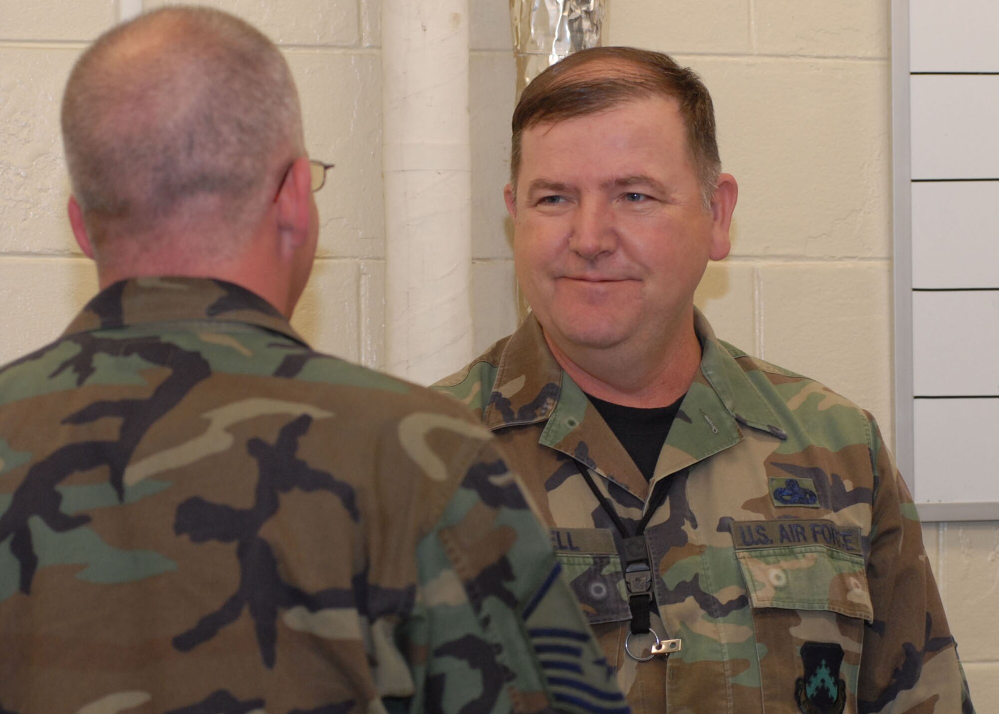 KUNSAN AIR BASE, Republic of Korea— Master Sergeant Kevin Newell, 8th Maintenance Squadron fabrication flight chief, talks with Chief Master Sergeant Owen Powell, 8th MXS superintendent, April 17 here.  (U.S. Air Force Photo/Staff Sgt Araceli Alarcon) 
