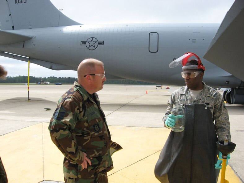 SEYMOUR JOHNSON AIR FORCE BASE, N.C. -- Master Sgt. Chris Scher (right) talks with Airman First Class Elven Mckay of the 911th Aircraft Maintenance Squadron. Sergeant Scher is the new ground safety manager for the 916th Air Refueling Wing. Sergeant Scher has a background in firefighting and EMT and was appointed as the 916th Maintenance Group safety monitor in the 1990s. "My main interest in this job is providing assistance to ensure safe and healthy environments for our members to work in," said Sgt. Scher. "My goal is to prevent mishaps by providing safety awareness throughout all areas of the wing. I want to give members the knowledge to prevent mishaps not only at work but at home as well."