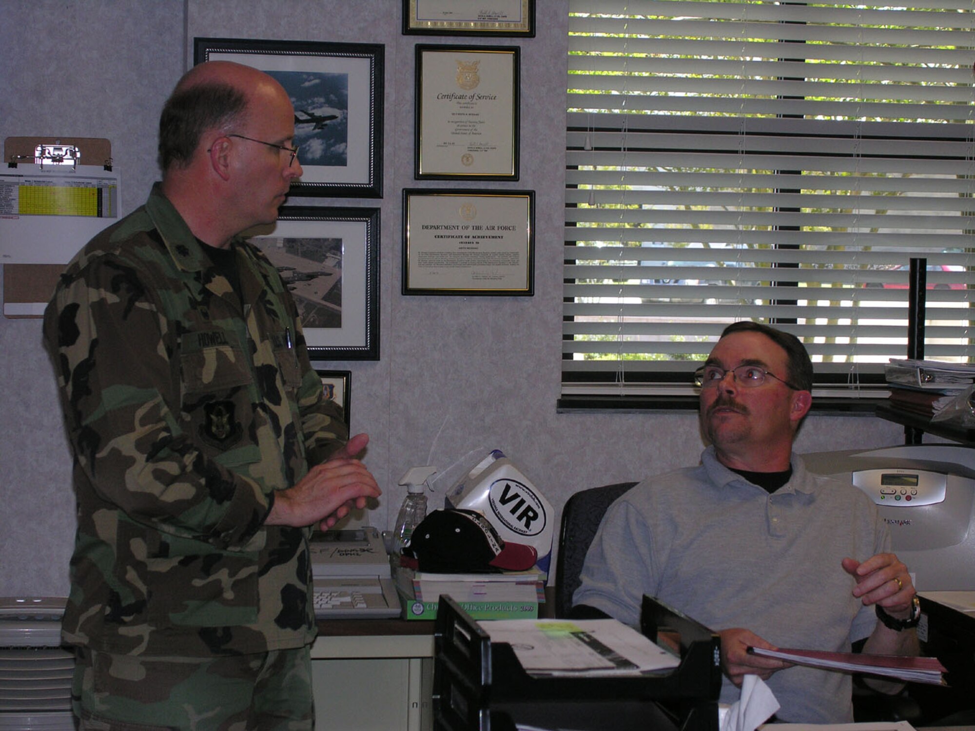 SEYMOUR JOHNSON AIR FORCE BASE, N.C. -- Lt. Col. Keith Howell (right) serves as the 916th Air Refueling Wing's Voting Officer.  U.S. Air Force photo/Ms. Donna Lea