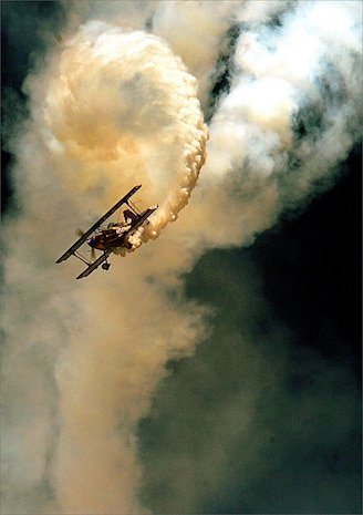 The Purple Violet Pitts S-2S Special Acromach Sky Dancer performs at the 2005 Royal International Air Tattoo Royal Air Force Fairford, United Kingdom, July 17, 2005. Ken Appezzato and his Pitts S-2C have been in aerobatics for more than 16 years and will perform at the 2008 "Wings Over Charleston" Air Expo.  (U.S. Air Force photo/Tech. Sgt. Jeremy Lock)