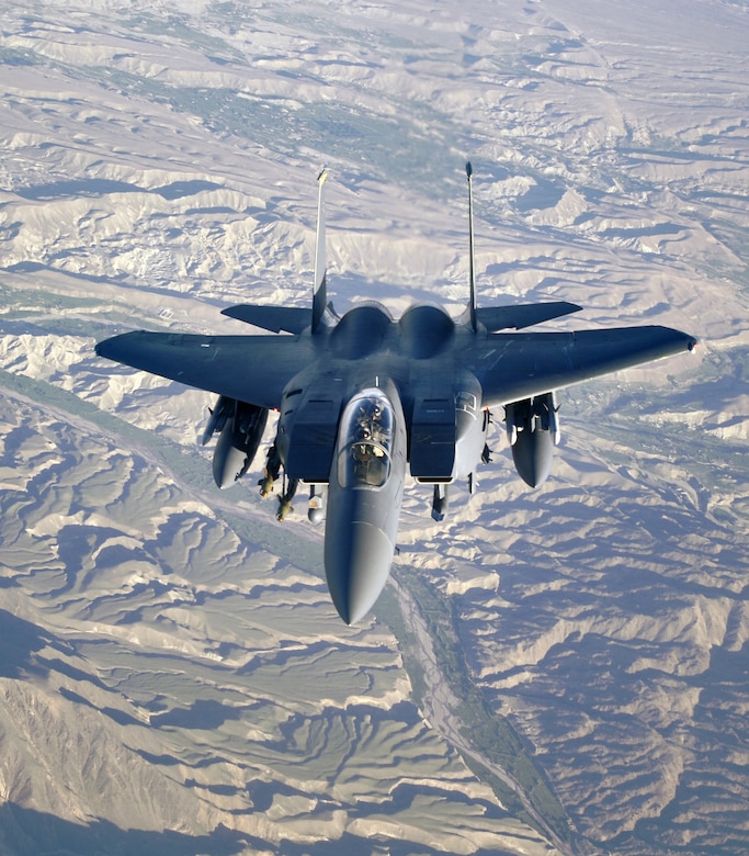 An F-15E Strike Eagle aircraft flies over Afghanistan in support of Operation Mountain Lion April 12, 2006.  The F-15E Strike Eagle Demo Team from Seymour-Johnson AFB, N.C., displays the F-15E's capabilities as a dual-role fighter designed to perform air-to-air and air-to-ground missions. (U.S. Air Force photo/Master Sgt. Lance Cheung)