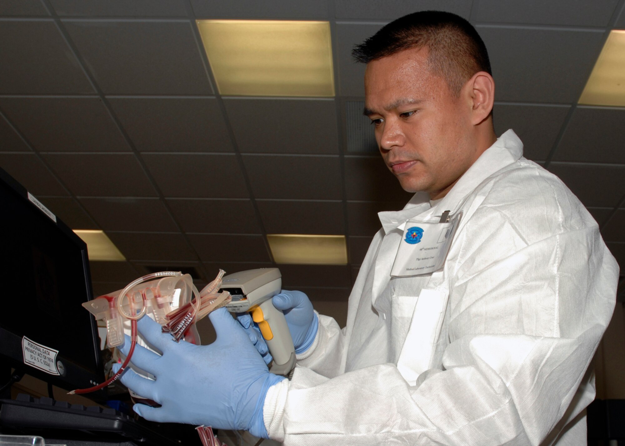 Tech. Sgt. Anthony Cruz, NCOIC of transfusion services, 48th Medical Services Squadron, prepares a unit of red blood cells for a patient April 2 at RAF Lakenheath, England. The Pathology laboratory at RAF Lakenheath was selected as the 2007 Air Force Medical Service Team of the Year.  (U.S. Air Force photo by Airman Perry Aston)