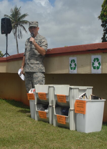 Col. Gregory Cain, 36th Wing vice commander, reads an Arbor Day proclamation during Andersen's Earth Day observance April 19 at Arc Light Memorial Field. (U.S. Air Force photo by Airman 1st Class Zachary Hunter)
