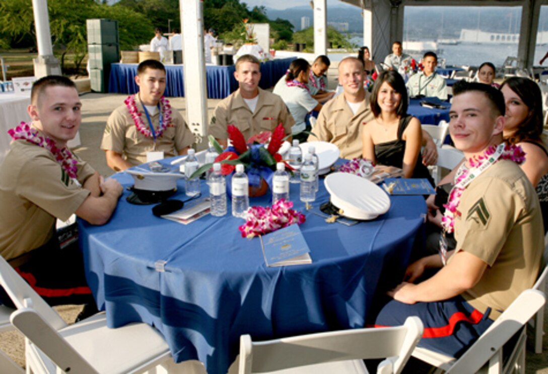 HONOLULU --  Service members of the joint color guard present the colors during the U.S. National Anthem and the Hawai'i Pono'i, the former naitonal anthem of Hawaiian  during the opening ceremony for Hawaii Military Appreciation Month held at the USS Missouri here, April 24.