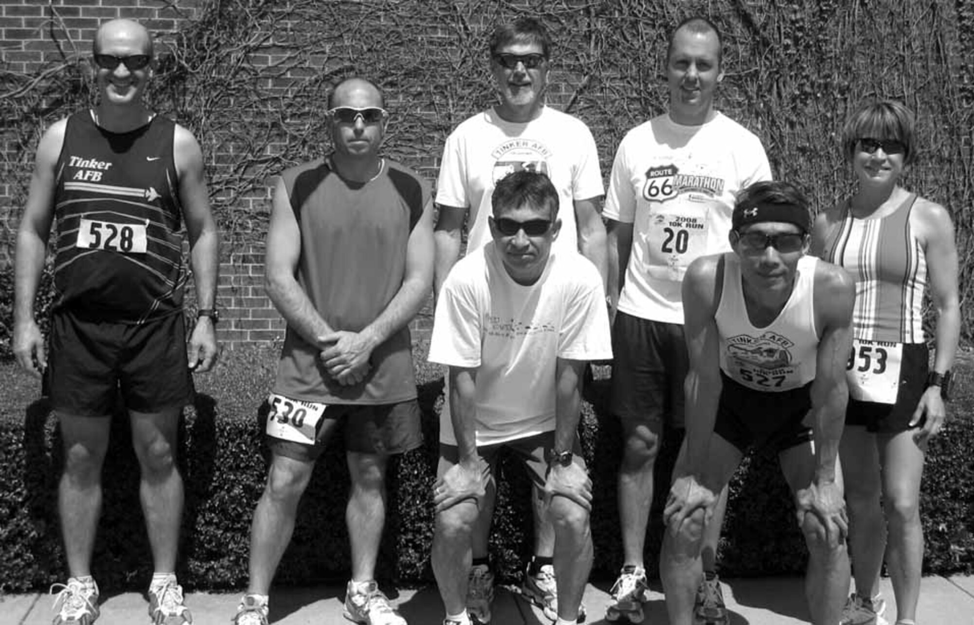 Tinker runners who participated in the Redbud Classic April 4 were, back row, Doug MacNeill, Shane Spencer. Danny Ponder, Brian Yort and Robin Garretson; front row, Robert Yara and Cuu Nguyen.  Not pictured are Willie Kinchion and Derle Smith.  (Courtesy photo)