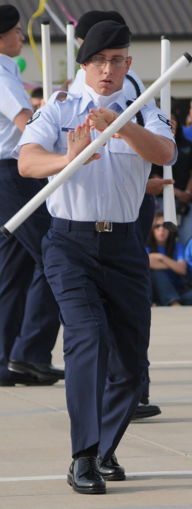 Airman Ramsey twirls his rifle during the Mad Dogs’ freestyle drill.  Although the 332nd TRS didn’t place in this category, its top scores in regulation drill and open ranks won the overall drill down title for April.  (U.S. Air Force photo by Kemberly Groue)