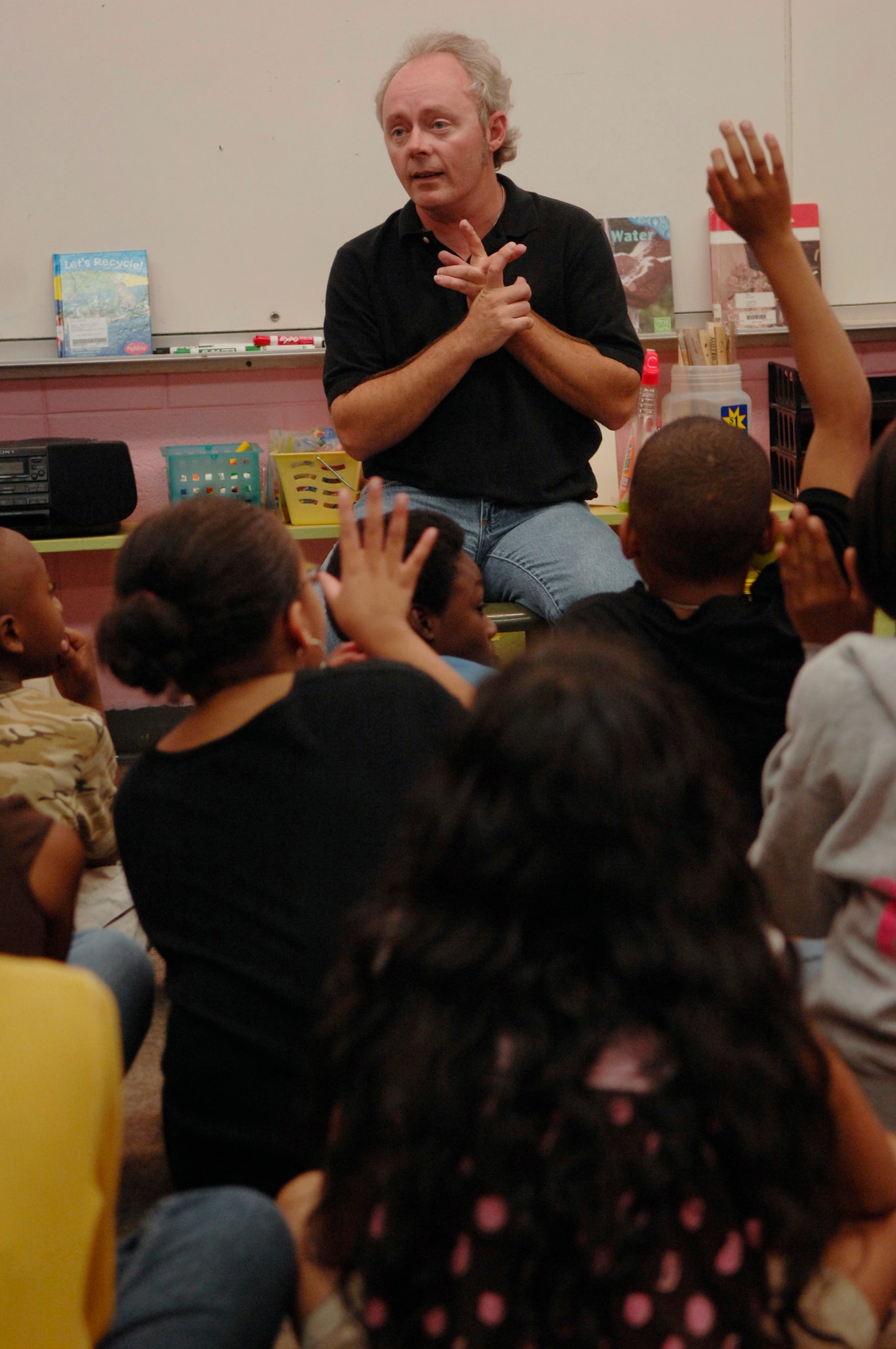 MOODY AIR FORCE BASE, Ga. -- Greg Haugen, 23rd Civil Engineering Squadron environmental specialist, talks to 3rd graders about energy and water conservation as part of earth day at the WG Nunn Elementary School in Valdosta, Ga., April 24. Earth day is held every year to learn on ways to protect our planet. (U.S. Air Force photo by Senior Airman Gina Chiaverotti)