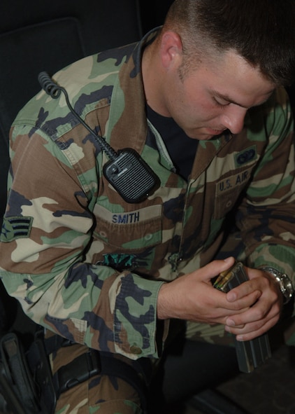 DYESS AIR FORCE BASE, Texas -- Senior Airman Justin Smith loads a magazine with 5.56 millimeter rounds inside of the armory April 22. The 5.56MM round is the round commonly associated with the M-16 A-2 service weapon. (U.S. Air Force Photo by Airman 1st Class Micheal Breaux)