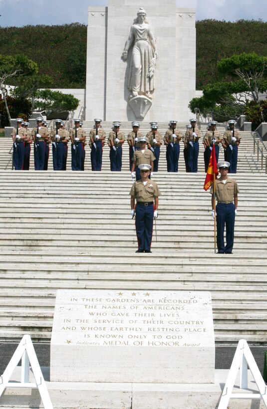 HONOLULU --  The Marine honor guard from 3rd Marine Regiment, Marine Corps Base Hawaii, Kaneohe Bay,  stands at attention for the posting of the colors during Australian and New Zealand Army Corps day at the National Memorial Cemetery of the Pacific (Punchbowl) here, April 25.