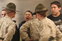 CAMP RIPLEY, Minn.- Drill instructors from both Marine Corps recruit depots were invited to Recruiting Station Twin Cities' Mini-Boot Camp April 25-27 to give 394 Delayed Entry Program members and guests a taste of Marine Corps Boot Camp. Photo by Staff Sgt. Stephen L. Traynham, Recruiting Station Twin Cities