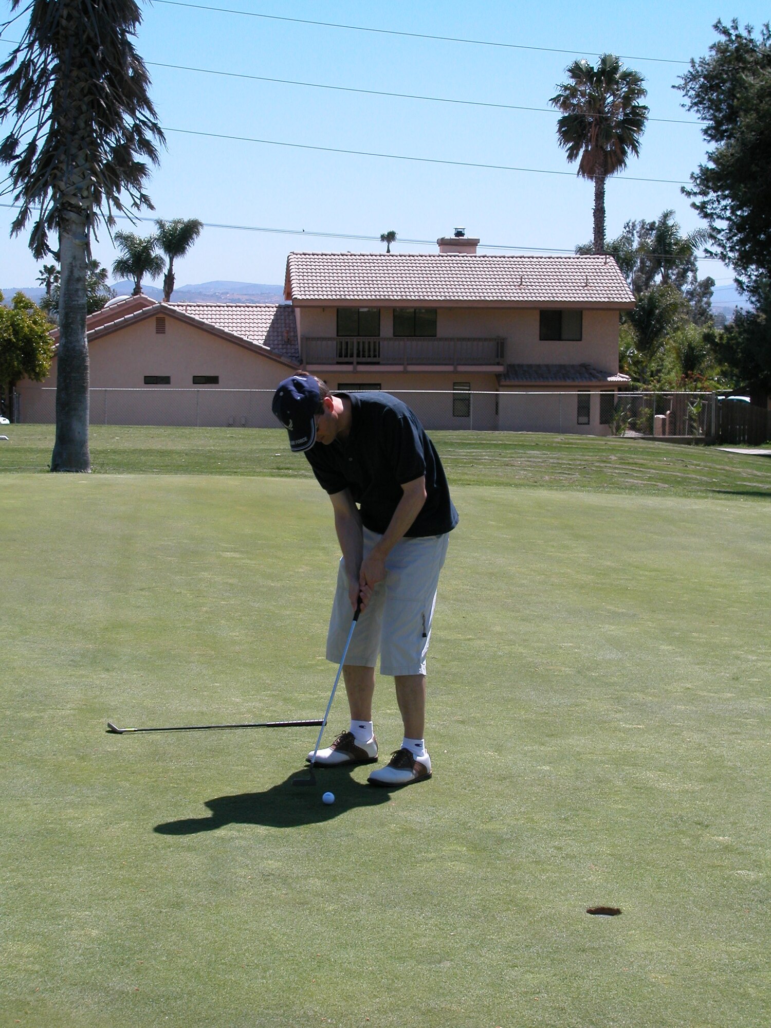 Colonel Jeff Barson, 452d AMW vice commander, concentrates on his putt. Team March golfers were hampered by a head wind at the annual Broken
Shaft golf tournament where the civilians of the community won the team
trophy by only 50 strokes. The annual golf game, organized by the Greater
Riverside Chambers of Commerce for more than 30 years, saw about 40
players take the course. This year’s tournament again was played at Jurupa Golf
Course. Awards were presented after the game for closest to the pin, low net
score, low gross score and best ball net. The players enjoyed dinner in the
club house as well as a good amount of teasing when the broken shaft trophy
was presented.

Top Teams for Best Balls Net
1st Place: Mike Bowery, Hap Heublein, Tim Plein, Elaine Plein
2nd Place: Don Brower, Hal Austin, Jeff Barnson, Steve Barnett
Closest to the Pin# 3: Dana Hessheim
Closest to the Pin# 18: Chuck Manley
1st Low Gross: Phil Rizzo (25)
2nd Low Gross: Mike Lanahan (80)
1st Low Net: Cam LeBlanc (63)
2nd Low Net: Bill Kimble (66)
Winners of the Trophy: Team MAC 1349
Winners of the Broken Shaft: Team March 1399
(U.S. Air Force photo by Maj. Don Traud)