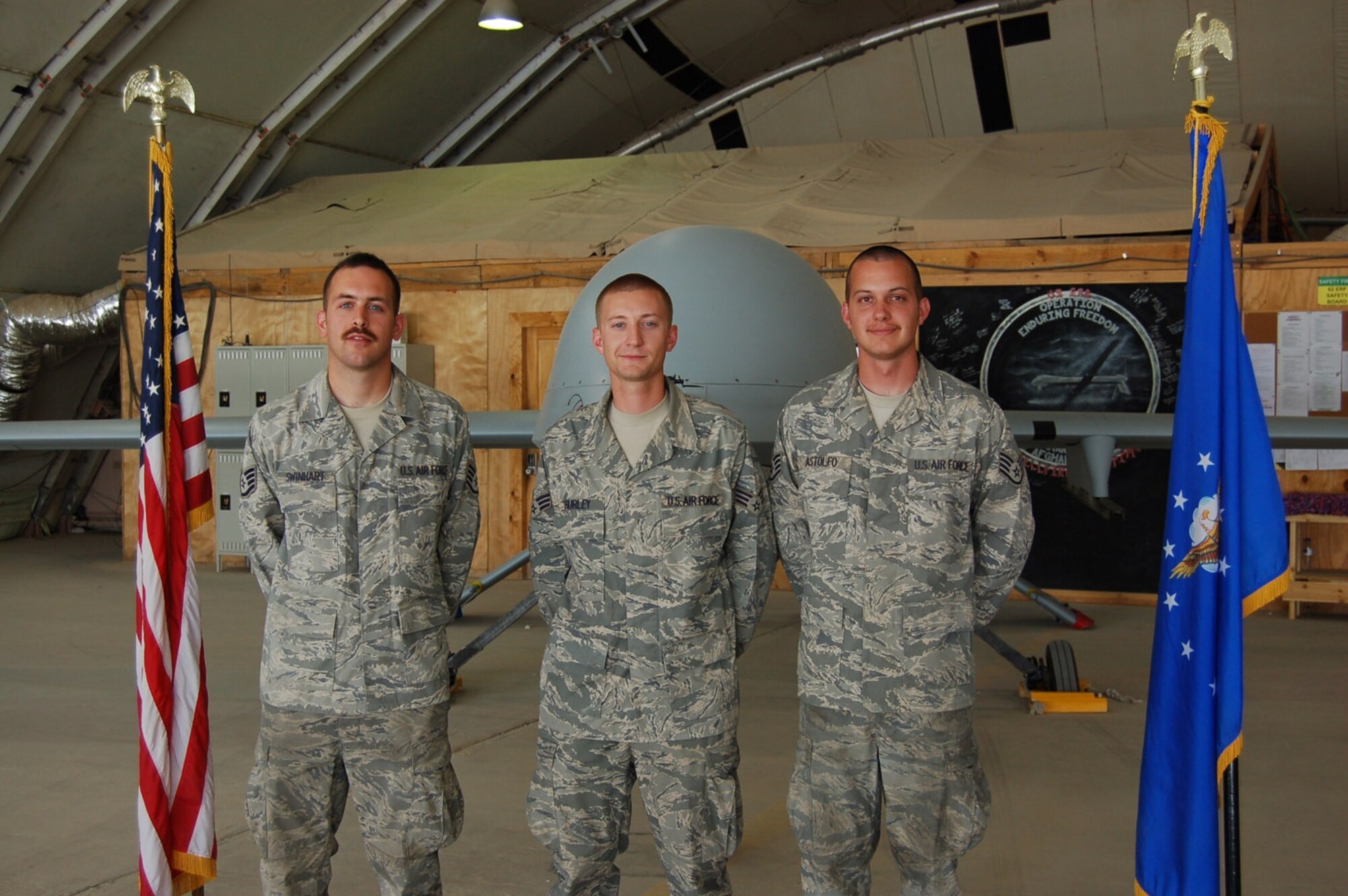 Staff Sgt. Skyler Swinhart, left, Senior Airman Eric Hurley and Staff Sgt.Michael Astolfo were all recognized for their accomplishments during a four month deployment to Kandahar Air Base in Afghanistan. (U.S. Air Force photo)