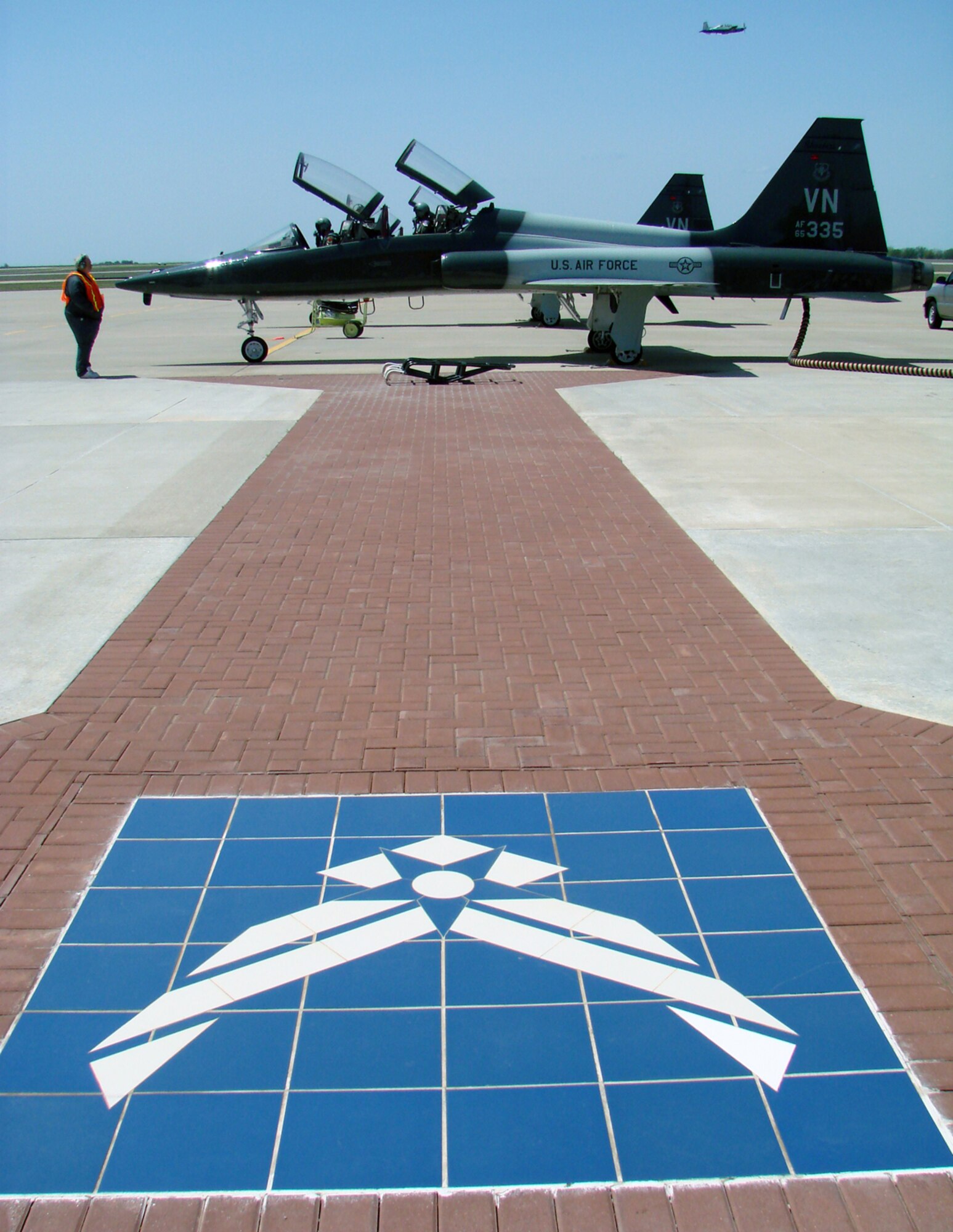 The Honorable Chris Benge, Oklahoma Speaker of the House, prepares to taxi for takeoff in front of base operations in a T-38 with Capt. Michael Pickett, 25th Flying Training Wing check flight. Representative Benge visited Vance April 25 for a wing orientation and a T-38 flight. Representative Benge's home district is in Tulsa.
