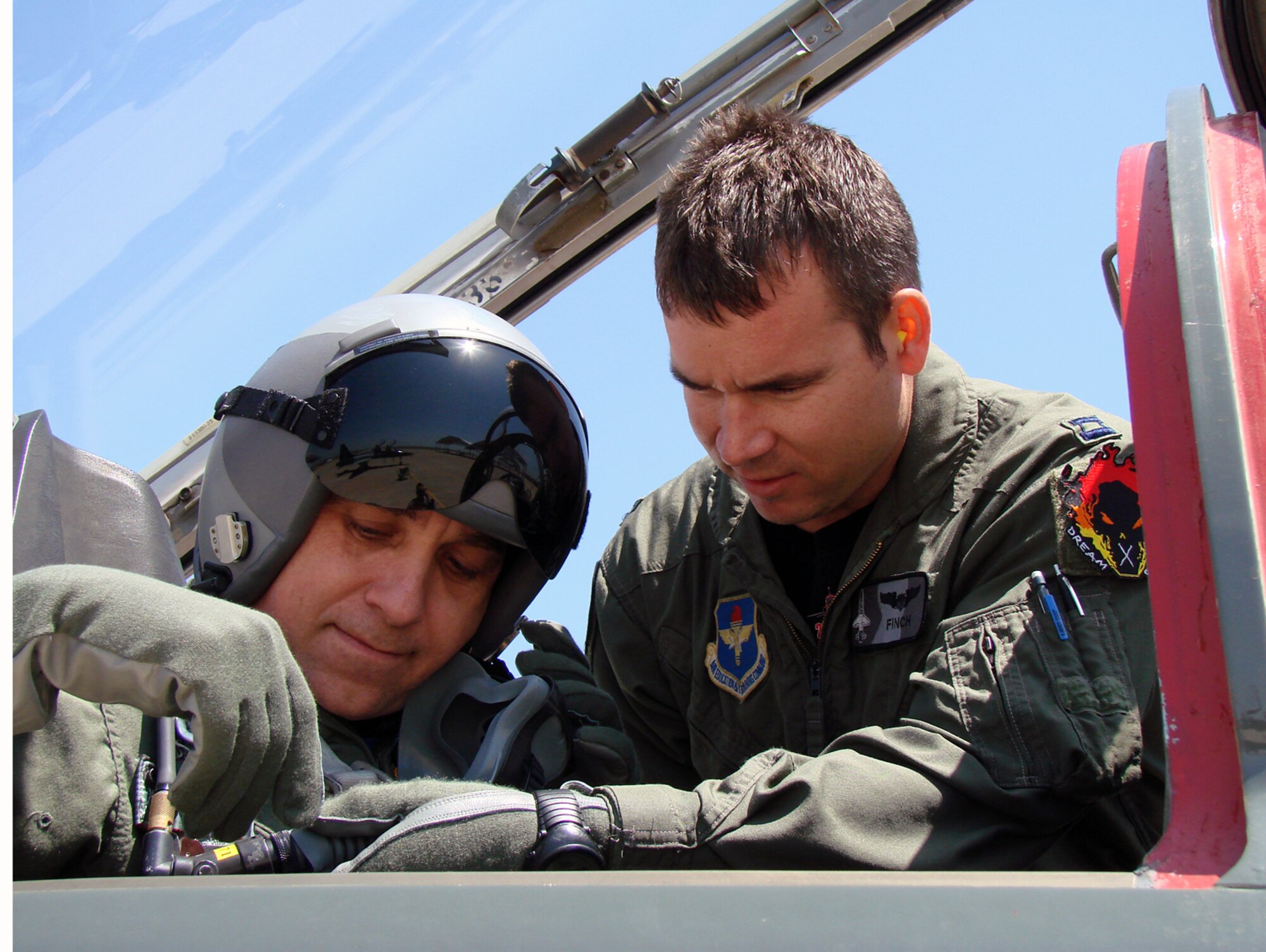 The Honorable Chris Benge, Oklahoma Speaker of the House, is strapped into a T-38 for an orientation flight with Capt. Michael Pickett, 25th Flying Training Wing check flight. Representative Benge visited Vance April 25 for a wing orientation and a T-38 flight. Representative Benge's home district is in Tulsa.