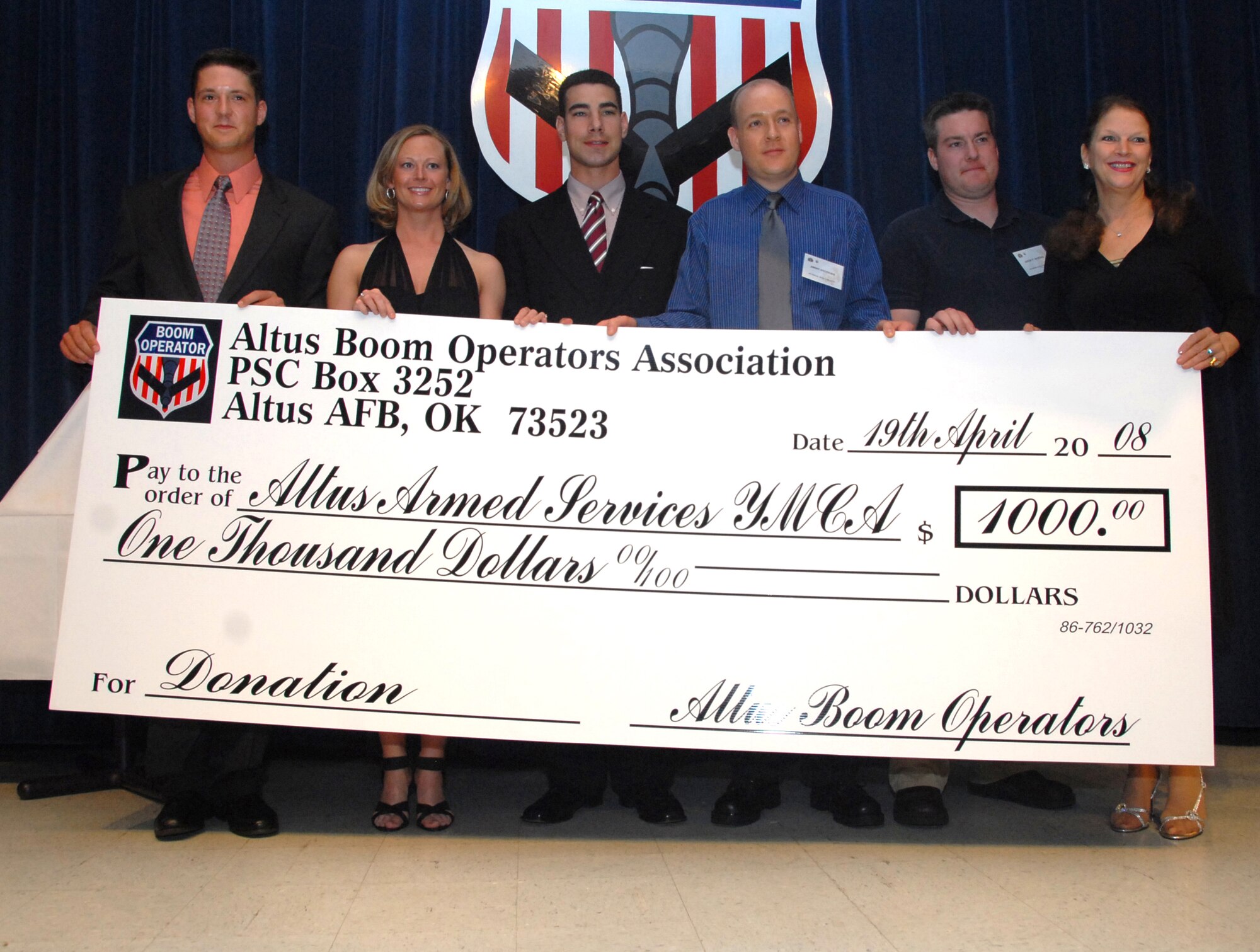 Altus Air Force Base, Okla. -- The Altus Boom Operator Association donated $1,000 to the Altus Armed Services YMCA during the 29th Annual Boom Symposium April 19. The sympsium is held every year to honor past and present boom operators. (U.S. Air Force photo/Airman 1st Class Cherice Bryant)