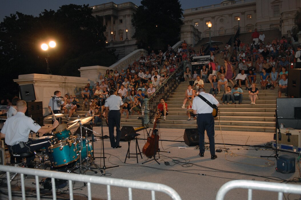 The United States Air Force Band's Silver Wings performs on the steps of the U.S. Capitol in August 2007. During the summer months, different components of the USAF Band provide free public concerts at various outdoor venues around Washington, D.C., including the steps of the U.S. Capitol, the base of the Washington Monument, and the Air Force Memorial in Arlington, Va. (Official Air Force photo by Airman 1st Class Rusti Caraker)
