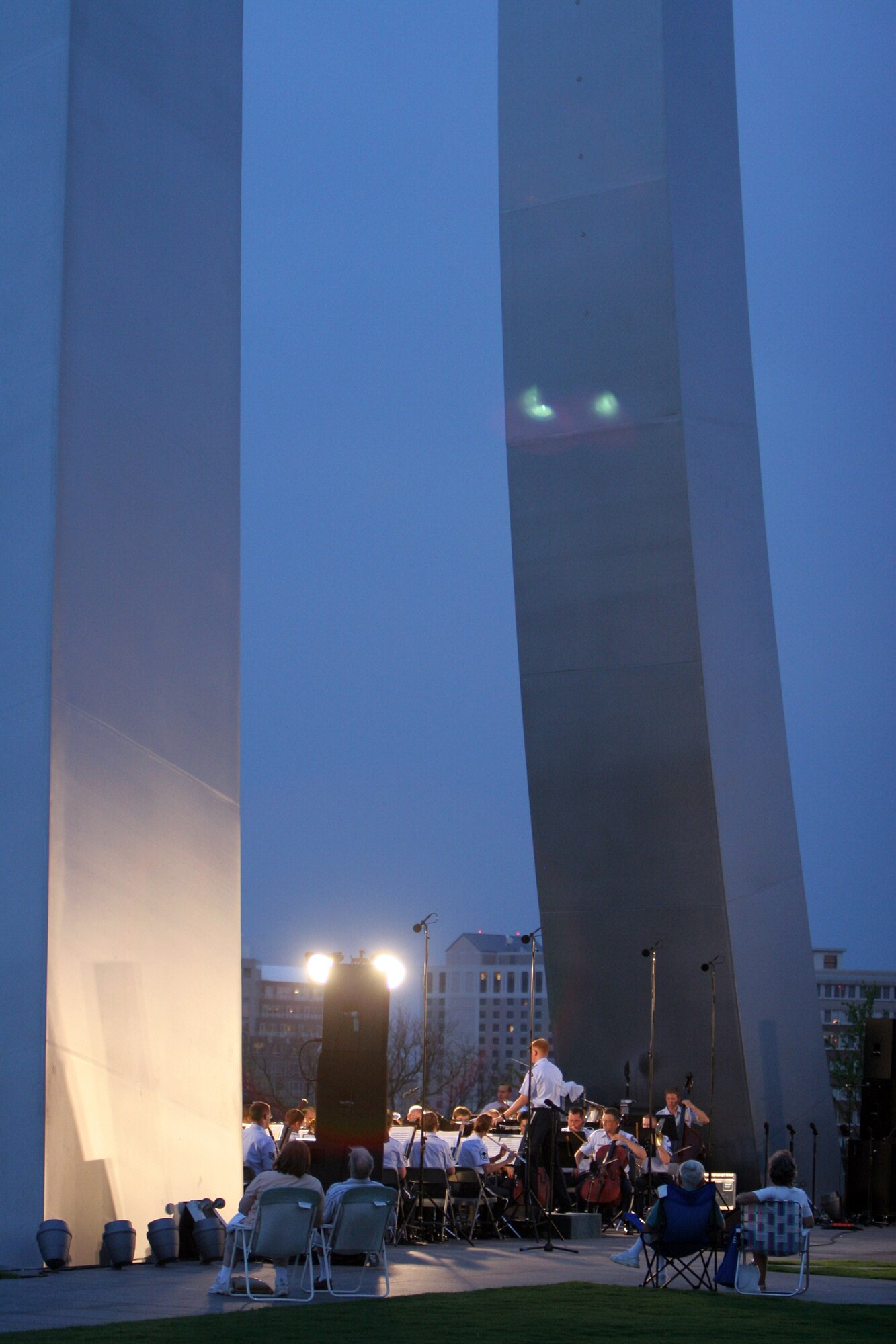 Captain Michael Murray conducts the USAF Concert Band at the Air Force Memorial in August 2007. During the summer months, different components of the USAF Band provide free public concerts at the base of the Air Force Memorial in Arlington, Va. (Official Air Force photo by Senior Master Sgt. Robert Mesite)