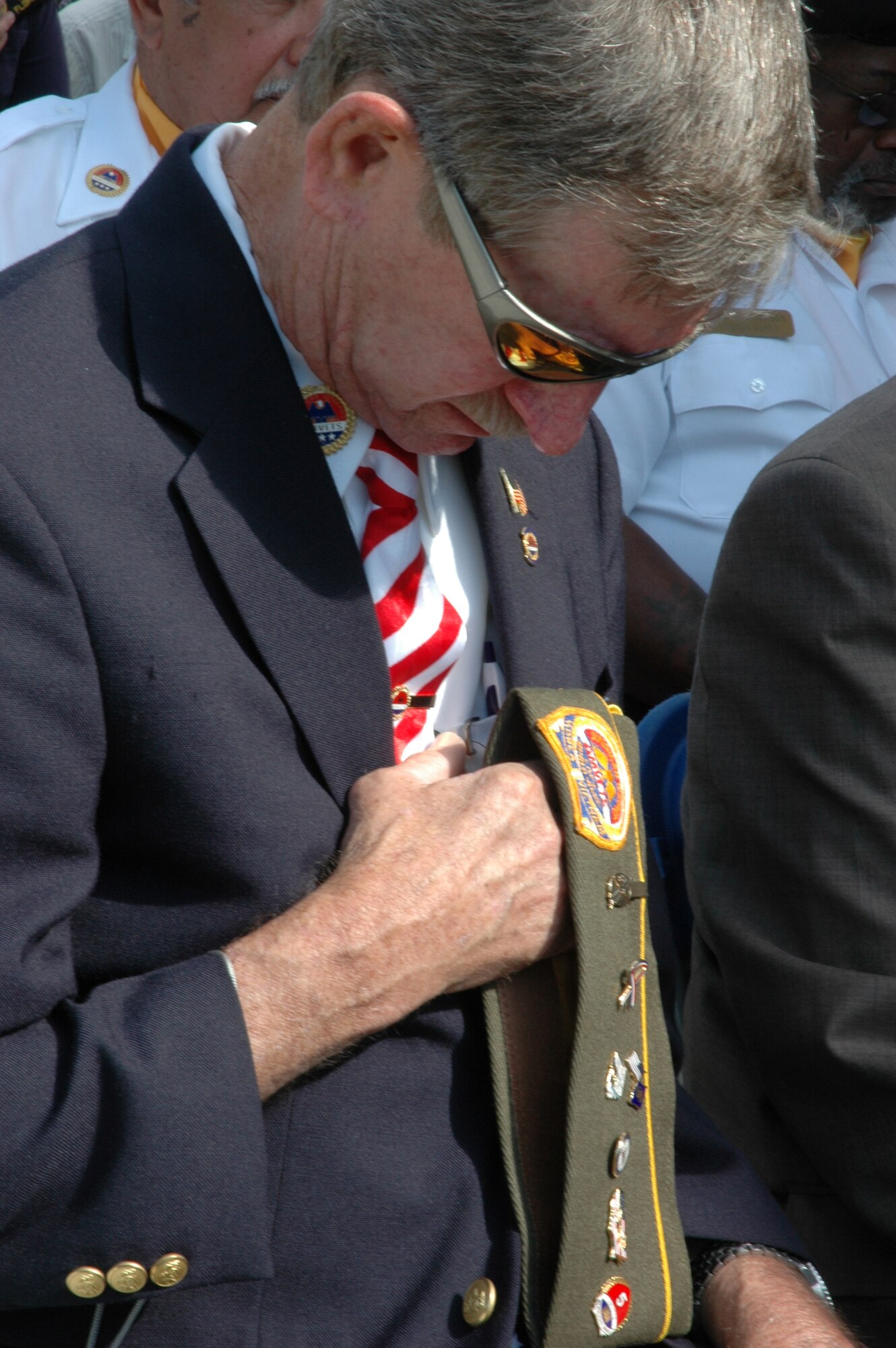EGLIN AIR FORCE BASE, Fla. -- Joe Rushing, American Veterans Post 78 commander, bows in honor of the invocation during the opening ceremony of the VA Eglin Community-based Outpatient Clinic April 25. (U.S. Air Force photo/Staff Sgt. Stacia Zachary)