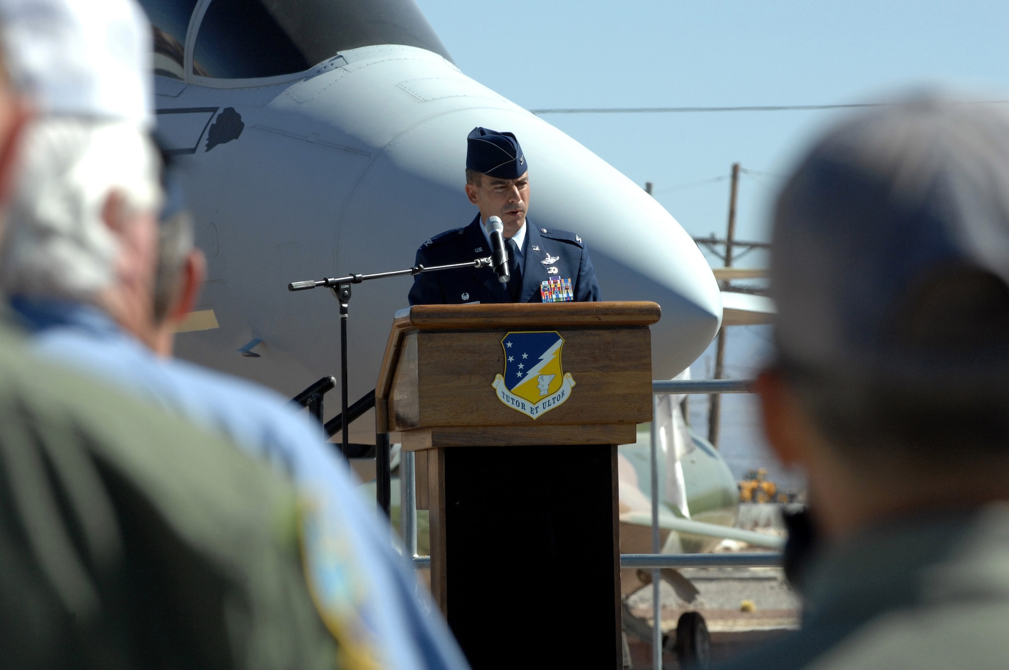 Colonel Jeff Harrigian, 49th Fighter Wing commander, says the opening remarks during the Sunset Stealth F-117A Retirement Ceremony Apr 21, Holloman Air Force Base, N.M.
(U.S. Air Force photo/ Senior Airman Anthony Nelson Jr)
