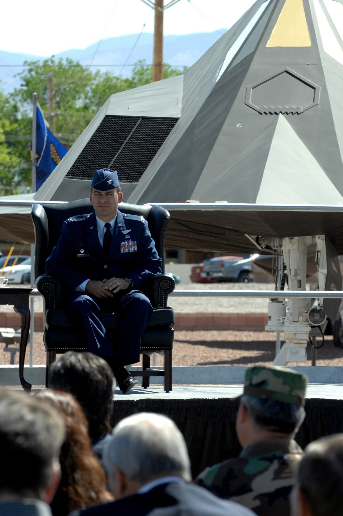 Colonel Jeff Harrigian sits and listens as Former Secretary of Defense Dr. William J. Perry speaks, during the Sunset Stealth F-117A Retirement Ceremony Apr 21, Holloman Air Force Base, N.M.
(U.S. Air Force photo/ Senior Airman Anthony Nelson Jr)
